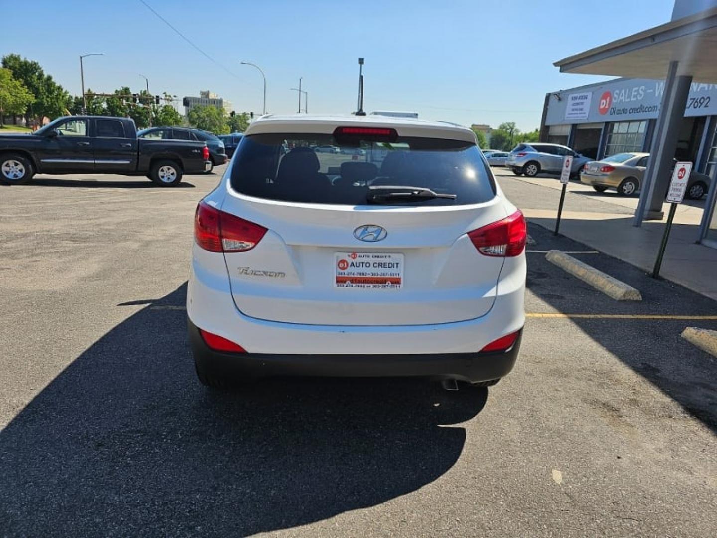 2014 Winter White /Taupe Hyundai Tucson GLS (KM8JT3AF1EU) with an 2.0L DOHC engine, Automatic transmission, located at 8595 Washington St., Thornton, CO, 80229, (303) 287-5511, 39.852348, -104.978447 - Are you in the market for a reliable and affordable SUV in Thornton, CO? Look no further than this pre-owned 2014 Hyundai Tucson GLS at D1 Auto Credit - Thornton. With its sleek winter white exterior and comfortable taupe interior, this 4D sport utility vehicle is sure to turn heads wherever you go. - Photo#6