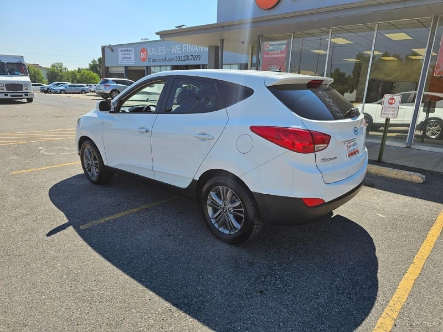 2014 Winter White /Taupe Hyundai Tucson GLS (KM8JT3AF1EU) with an 2.0L DOHC engine, Automatic transmission, located at 8595 Washington St., Thornton, CO, 80229, (303) 287-5511, 39.852348, -104.978447 - Are you in the market for a reliable and affordable SUV in Thornton, CO? Look no further than this pre-owned 2014 Hyundai Tucson GLS at D1 Auto Credit - Thornton. With its sleek winter white exterior and comfortable taupe interior, this 4D sport utility vehicle is sure to turn heads wherever you go. - Photo#7