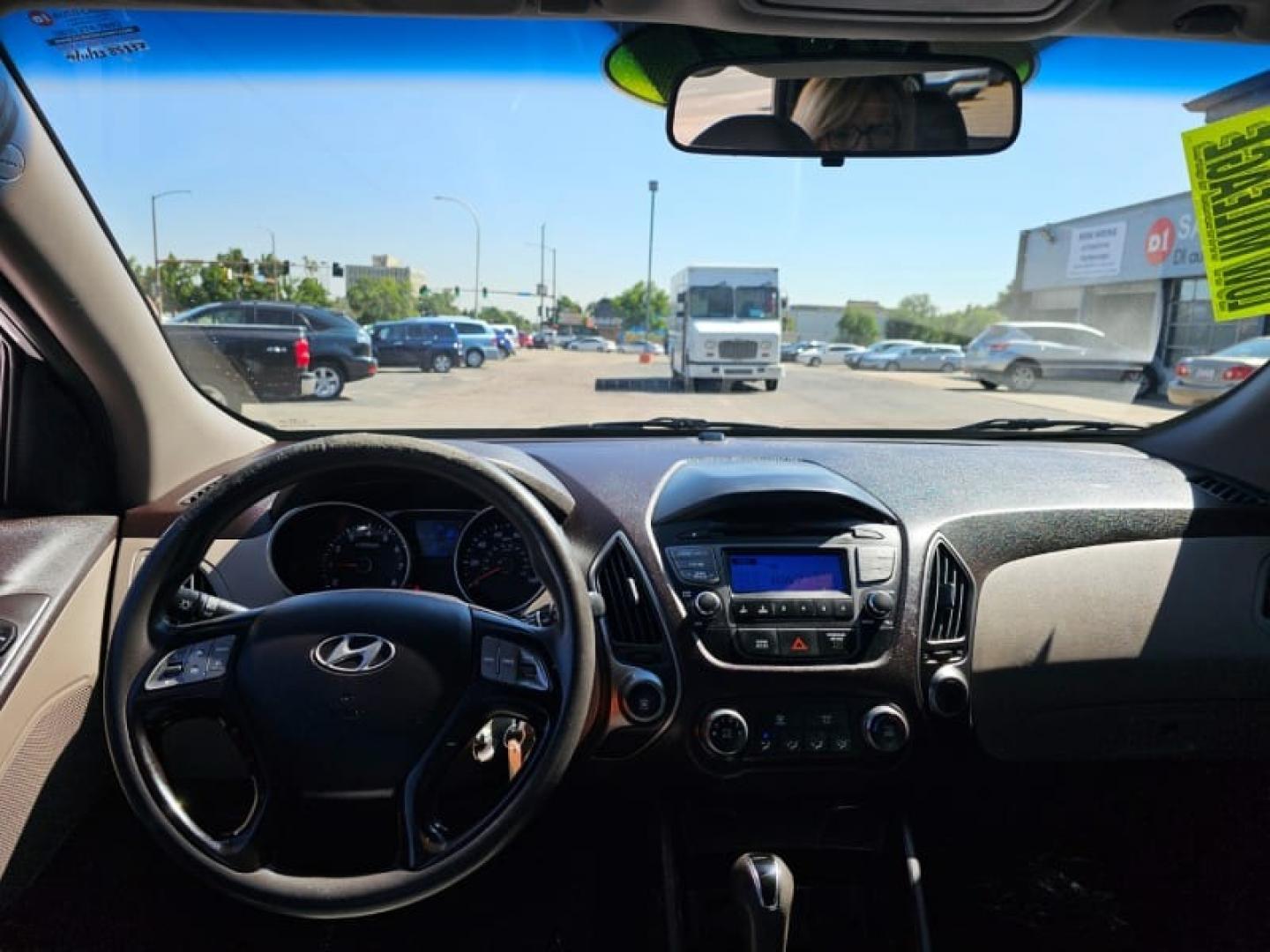 2014 Winter White /Taupe Hyundai Tucson GLS (KM8JT3AF1EU) with an 2.0L DOHC engine, Automatic transmission, located at 8595 Washington St., Thornton, CO, 80229, (303) 287-5511, 39.852348, -104.978447 - Are you in the market for a reliable and affordable SUV in Thornton, CO? Look no further than this pre-owned 2014 Hyundai Tucson GLS at D1 Auto Credit - Thornton. With its sleek winter white exterior and comfortable taupe interior, this 4D sport utility vehicle is sure to turn heads wherever you go. - Photo#8