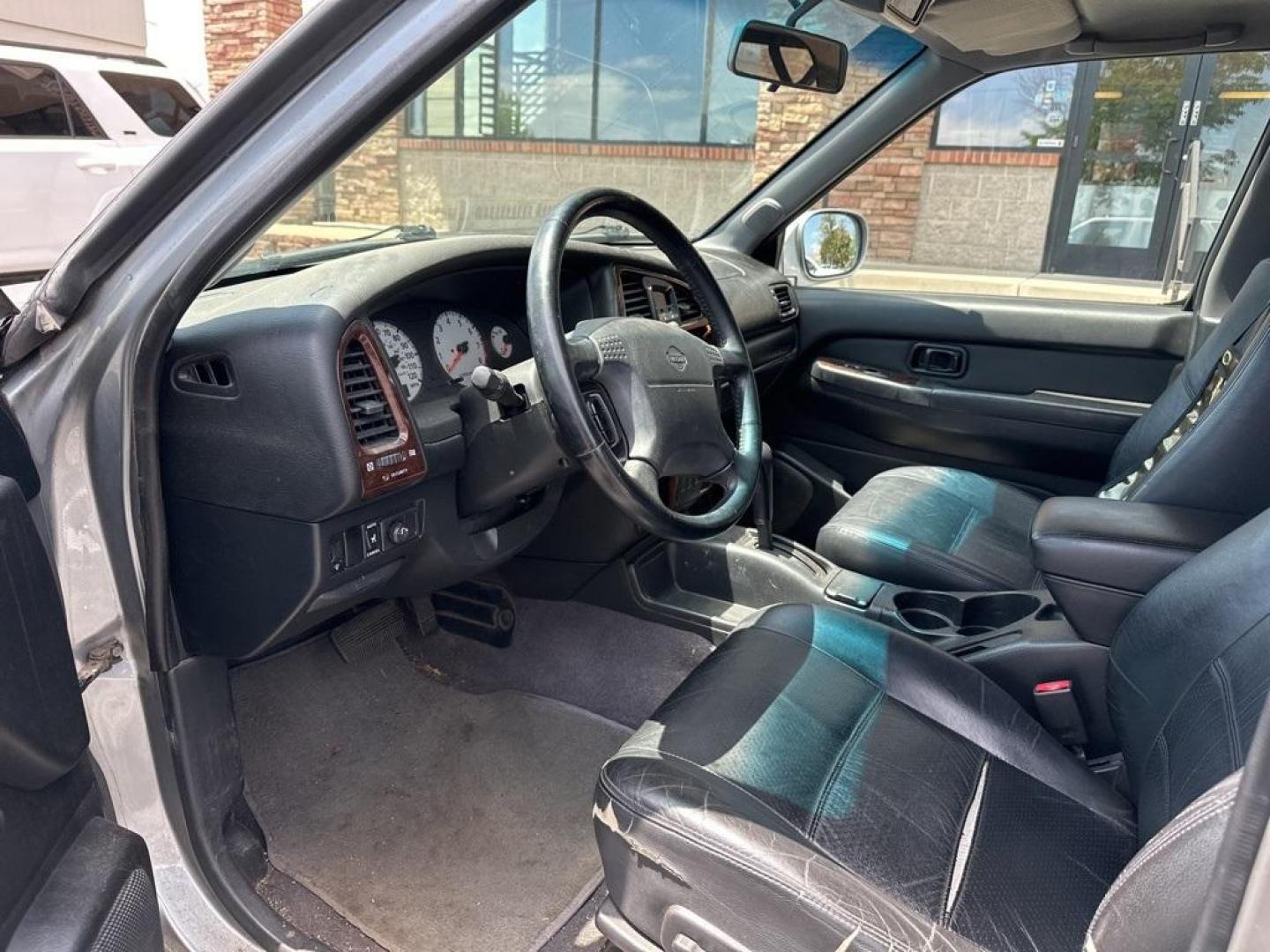 2001 Sierra Silver Metallic /Charcoal Nissan Pathfinder LE (JN8DR09X11W) with an 3.5L V6 SMPI DOHC engine, Automatic transmission, located at 8595 Washington St., Thornton, CO, 80229, (303) 287-5511, 39.852348, -104.978447 - 2001 Nissan Pathfinder<br><br>D1 Auto NEVER charges dealer fees! All cars have clean titles and have been inspected for mechanical issues. We have financing for everyone. Good credit, bad credit, first time buyers.<br><br>Please call Lakewood Location 303-274-7692 or Thornton 303-287-5511 to schedul - Photo#9