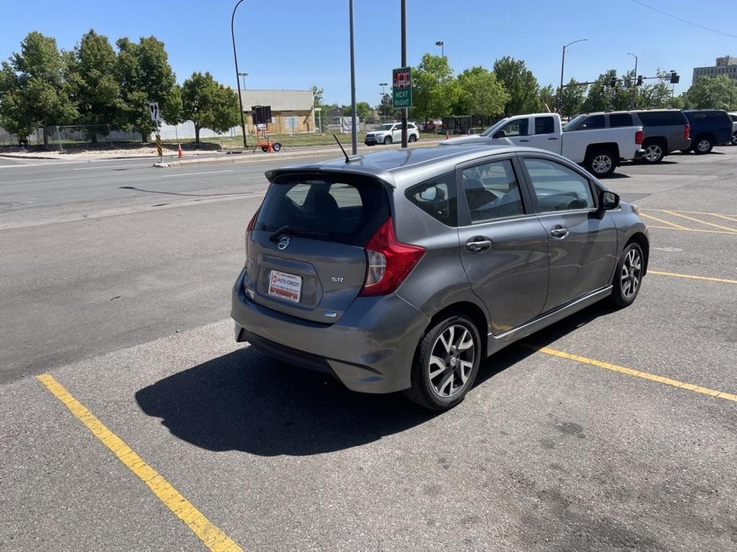 2016 Gun Metallic /Charcoal Nissan Versa Note SR (3N1CE2CP7GL) with an 1.6L 4-Cylinder DOHC 16V engine, CVT transmission, located at 8595 Washington St., Thornton, CO, 80229, (303) 287-5511, 39.852348, -104.978447 - 2016 Nissan Versa Note<br><br>D1 Auto NEVER charges dealer fees! All cars have clean titles and have been inspected for mechanical issues. We have financing for everyone. Good credit, bad credit, first time buyers.<br><br>Please call Lakewood Location 303-274-7692 or Thornton 303-287-5511 to schedul - Photo#5