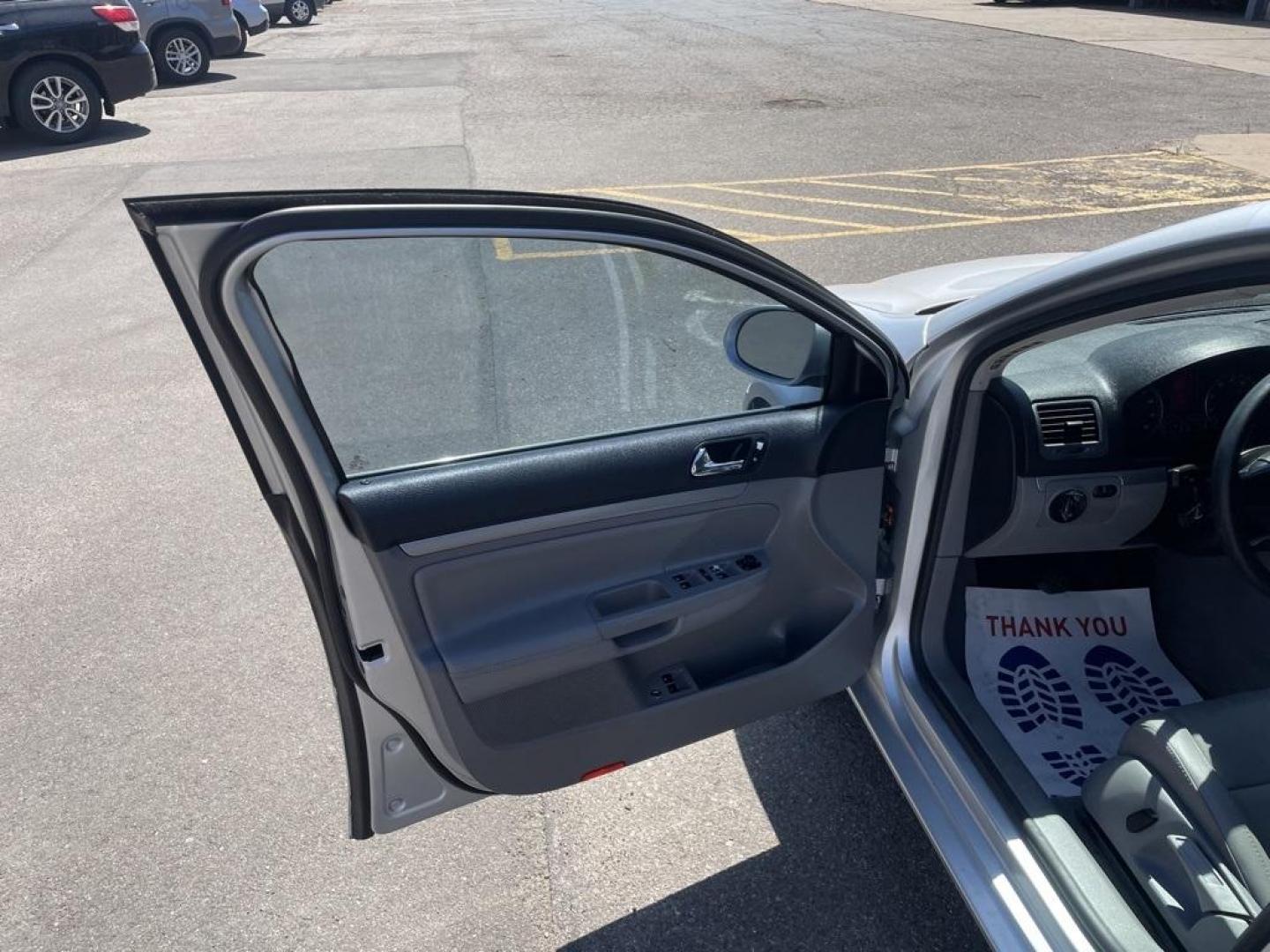 2005 Platinum Gray /Gray Volkswagen Jetta 2.5 (3VWSF71K95M) with an 2.5L I5 SMPI DOHC engine, Manual transmission, located at 8595 Washington St., Thornton, CO, 80229, (303) 287-5511, 39.852348, -104.978447 - 2005 Volkswagen Jetta<br><br>D1 Auto NEVER charges dealer fees! All cars have clean titles and have been inspected for mechanical issues. We have financing for everyone. Good credit, bad credit, first time buyers.<br><br>Please call Lakewood Location 303-274-7692 or Thornton 303-287-5511 to schedule - Photo#15