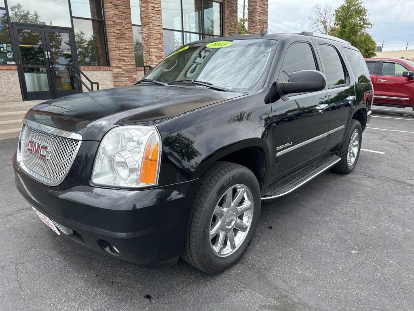 2013 Onyx Black /Ebony GMC Yukon Denali (1GKS2EEF8DR) with an Vortec 6.2L V8 SFI VVT Flex Fuel engine, Automatic transmission, located at 8595 Washington St., Thornton, CO, 80229, (303) 287-5511, 39.852348, -104.978447 - 2013 GMC Yukon<br><br>D1 Auto NEVER charges dealer fees! All cars have clean titles and have been inspected for mechanical issues. We have financing for everyone. Good credit, bad credit, first time buyers.<br><br>Please call Lakewood Location 303-274-7692 or Thornton 303-287-5511 to schedule a test - Photo#1