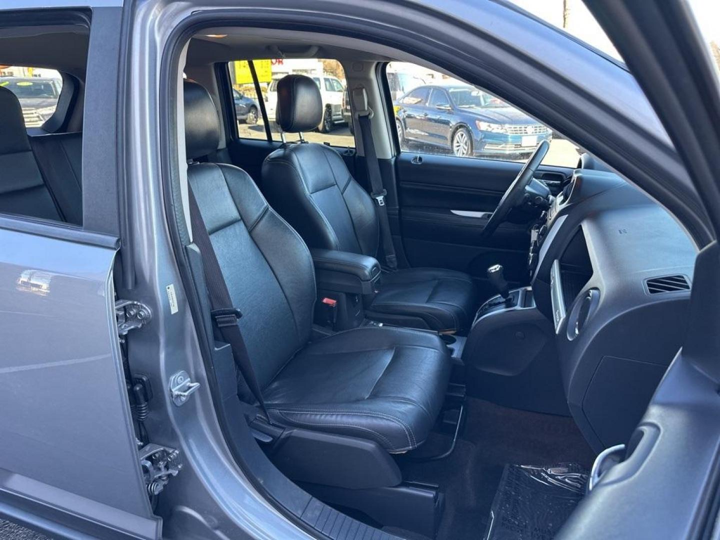 2015 Billet Silver Metallic Clearcoat /Gray Jeep Compass Altitude (1C4NJDEBXFD) with an 2.4L I4 DOHC 16V Dual VVT engine, Automatic transmission, located at 8595 Washington St., Thornton, CO, 80229, (303) 287-5511, 39.852348, -104.978447 - D1 Auto NEVER charges dealer fees! All cars have clean titles and have been inspected for mechanical issues. We have financing for everyone. Good credit, bad credit, first time buyers. <br><br>2015 Jeep Compass<br>Leather, Heated Seats, Power Seats, 6-Speed Automatic, 4WD.<br><br>Please call or text - Photo#18