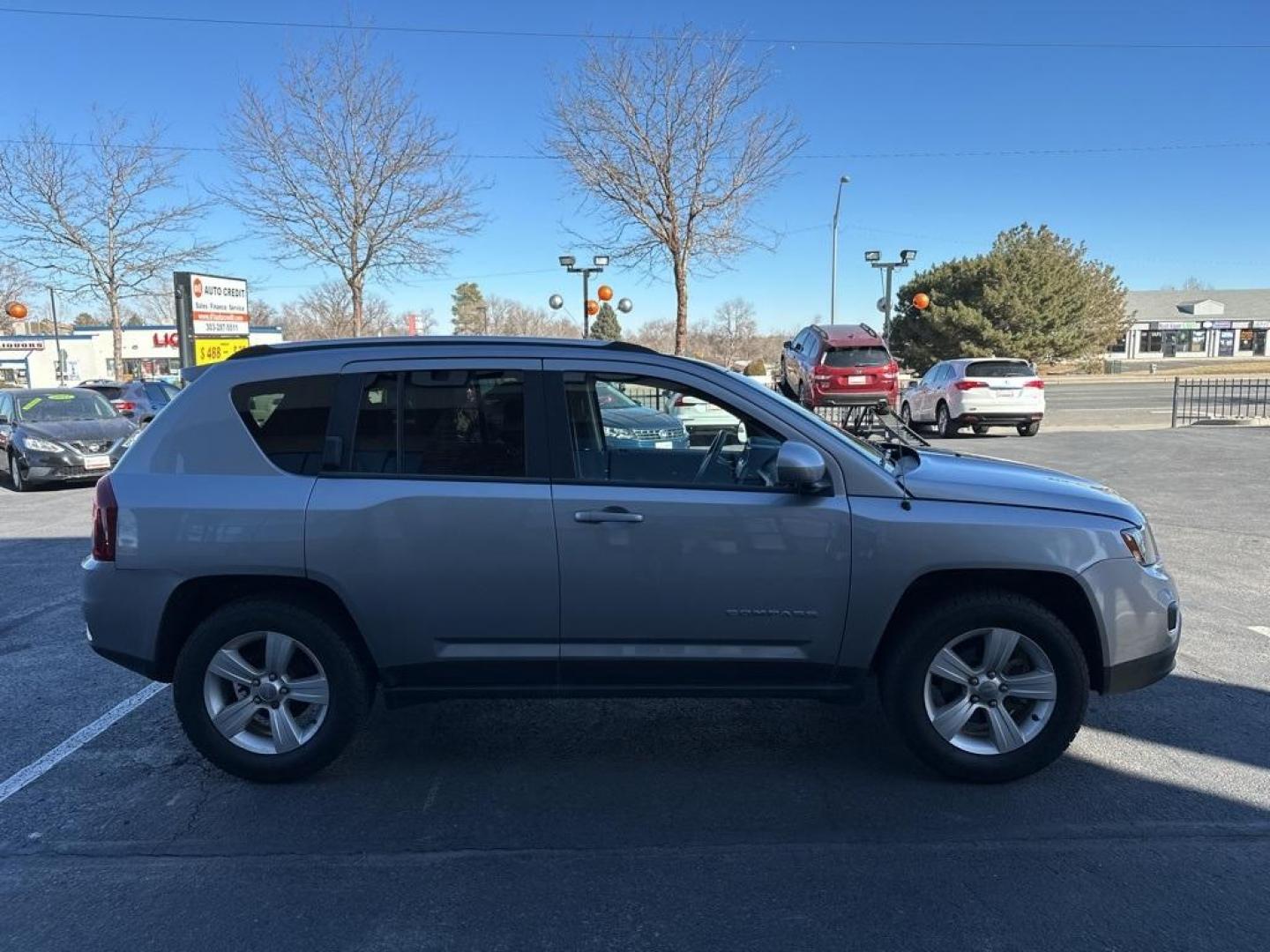 2015 Billet Silver Metallic Clearcoat /Gray Jeep Compass Altitude (1C4NJDEBXFD) with an 2.4L I4 DOHC 16V Dual VVT engine, Automatic transmission, located at 8595 Washington St., Thornton, CO, 80229, (303) 287-5511, 39.852348, -104.978447 - D1 Auto NEVER charges dealer fees! All cars have clean titles and have been inspected for mechanical issues. We have financing for everyone. Good credit, bad credit, first time buyers. <br><br>2015 Jeep Compass<br>Leather, Heated Seats, Power Seats, 6-Speed Automatic, 4WD.<br><br>Please call or text - Photo#4