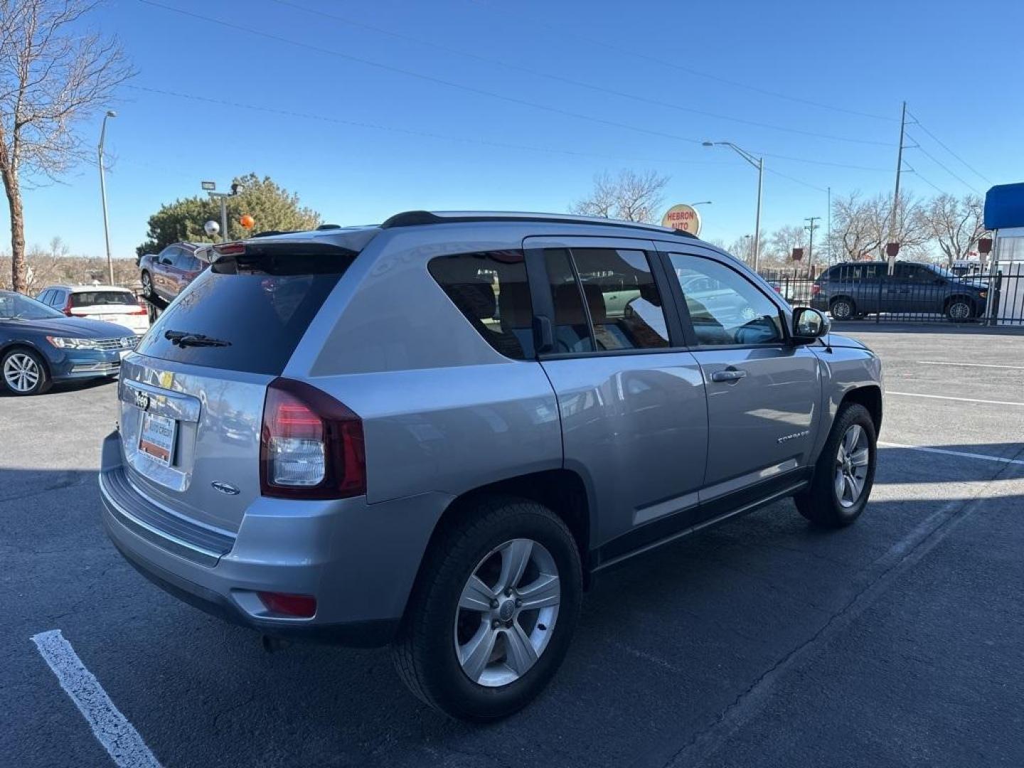 2015 Billet Silver Metallic Clearcoat /Gray Jeep Compass Altitude (1C4NJDEBXFD) with an 2.4L I4 DOHC 16V Dual VVT engine, Automatic transmission, located at 8595 Washington St., Thornton, CO, 80229, (303) 287-5511, 39.852348, -104.978447 - D1 Auto NEVER charges dealer fees! All cars have clean titles and have been inspected for mechanical issues. We have financing for everyone. Good credit, bad credit, first time buyers. <br><br>2015 Jeep Compass<br>Leather, Heated Seats, Power Seats, 6-Speed Automatic, 4WD.<br><br>Please call or text - Photo#5