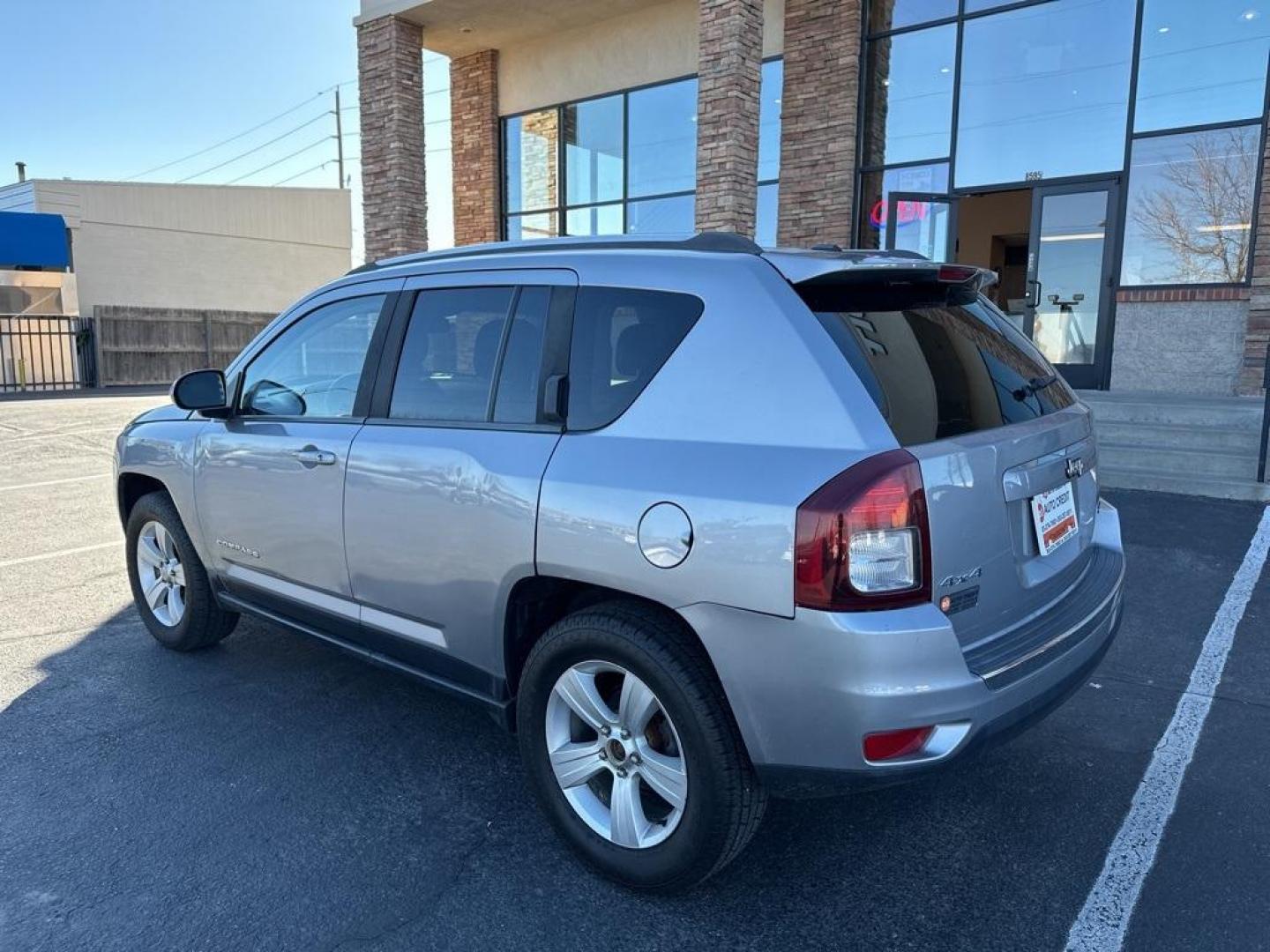 2015 Billet Silver Metallic Clearcoat /Gray Jeep Compass Altitude (1C4NJDEBXFD) with an 2.4L I4 DOHC 16V Dual VVT engine, Automatic transmission, located at 8595 Washington St., Thornton, CO, 80229, (303) 287-5511, 39.852348, -104.978447 - D1 Auto NEVER charges dealer fees! All cars have clean titles and have been inspected for mechanical issues. We have financing for everyone. Good credit, bad credit, first time buyers. <br><br>2015 Jeep Compass<br>Leather, Heated Seats, Power Seats, 6-Speed Automatic, 4WD.<br><br>Please call or text - Photo#7