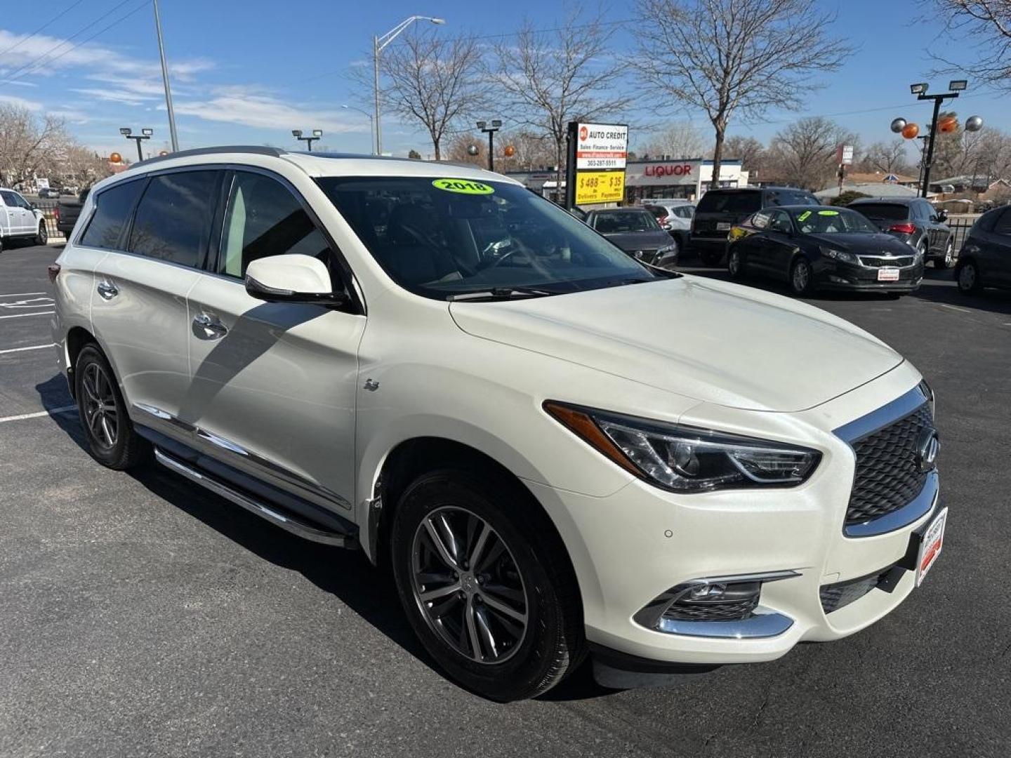 2018 Majestic White /Java INFINITI QX60 Base (5N1DL0MM6JC) with an 3.5L V6 engine, CVT transmission, located at 8595 Washington St., Thornton, CO, 80229, (303) 287-5511, 39.852348, -104.978447 - This is the one! Clean carfax, non smoker, non pet car. Interior is like new and the exterior is in near mint condition. Loaded with tons of USB ports on all 3 rows, very easy to access 3rd row.<br><br>Heated seats, heated steering wheel, sun roof, navigation, BOSE speakers, backup camera wit 360 de - Photo#2