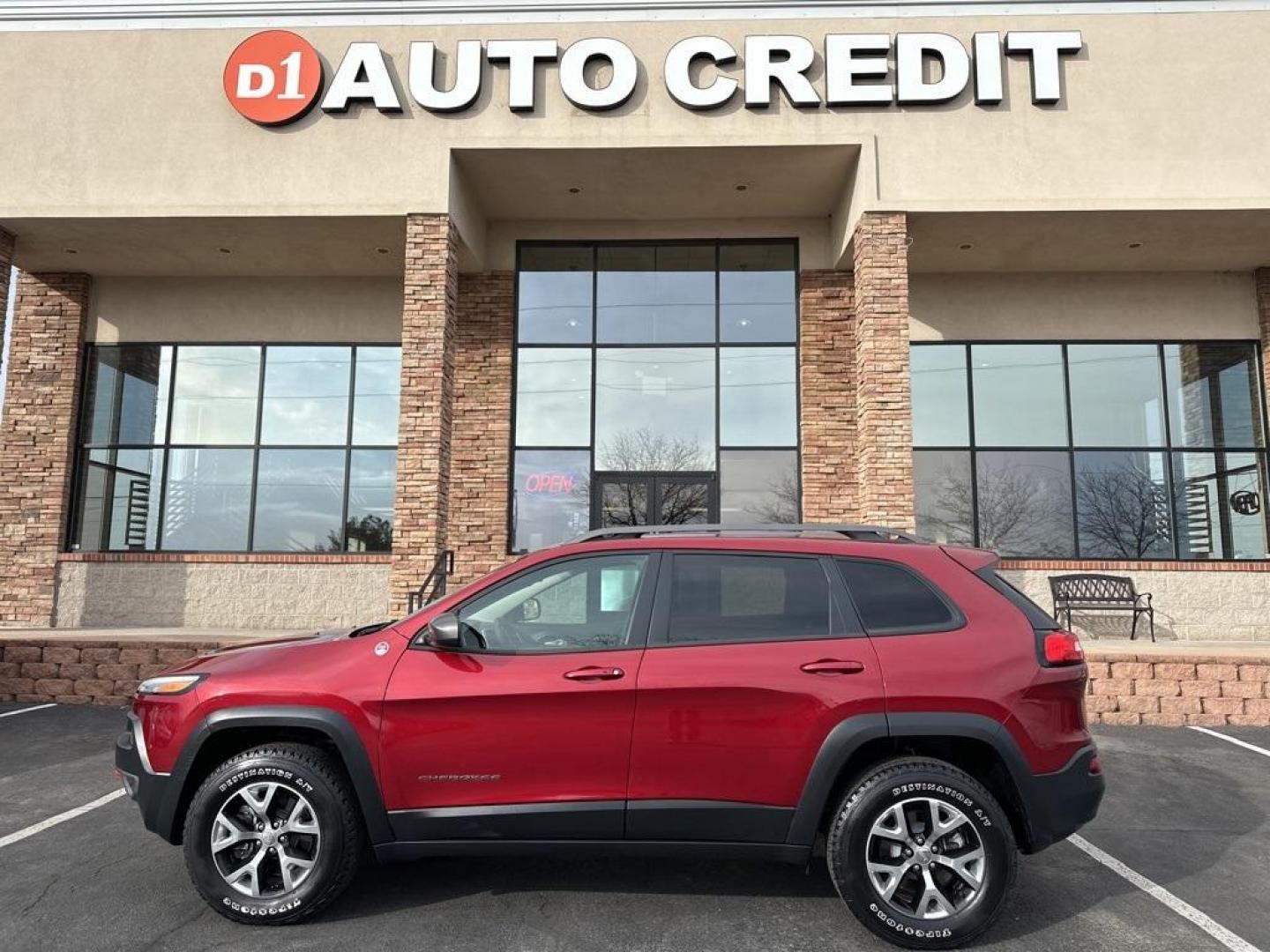 2016 Deep Cherry Red Crystal Pearlcoat /Black Jeep Cherokee Trailhawk (1C4PJMBS6GW) with an 3.2L V6 engine, Automatic transmission, located at 8595 Washington St., Thornton, CO, 80229, (303) 287-5511, 39.852348, -104.978447 - Like new condition with a clean title and no accidents. Very low miles. We NEVER charge dealer fees!<br><br>Leather, Cold Weather Group, Engine Block Heater, Heated Front Seats, Heated Steering Wheel, Jeep Rack Off Road Accessory Kit, ParkView Rear Back-Up Camera, Power Heated Mirrors, Power Liftgat - Photo#0