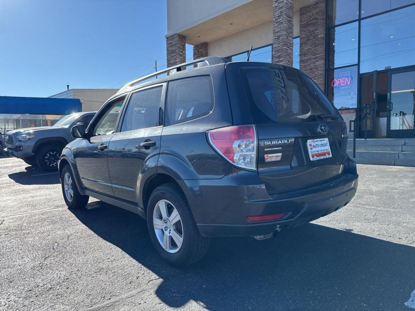 2012 Dark Gray Metallic /Platinum Subaru Forester 2.5X (JF2SHBBC1CH) with an 2.5L 4-Cylinder DOHC 16V VVT engine, Automatic transmission, located at 8595 Washington St., Thornton, CO, 80229, (303) 287-5511, 39.852348, -104.978447 - 2012 Subaru Forester AWD All Cars Have Clean Titles And Are Serviced Before Sale., Non Smoker, No Pet Odor Or Hair, Forester 2.5X, AWD.<br><br>D1 Auto NEVER charges dealer fees! All cars have clean titles and have been inspected for mechanical issues. We have financing for everyone. Good credit, bad - Photo#7