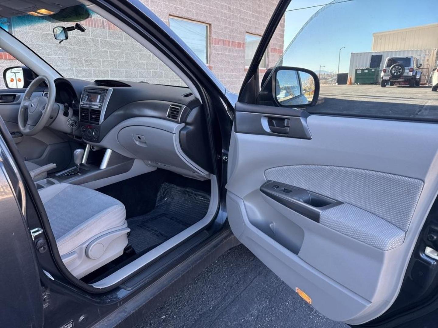 2012 Dark Gray Metallic /Platinum Subaru Forester 2.5X (JF2SHBBC1CH) with an 2.5L 4-Cylinder DOHC 16V VVT engine, Automatic transmission, located at 8595 Washington St., Thornton, CO, 80229, (303) 287-5511, 39.852348, -104.978447 - 2012 Subaru Forester AWD All Cars Have Clean Titles And Are Serviced Before Sale., Non Smoker, No Pet Odor Or Hair, Forester 2.5X, AWD.<br><br>D1 Auto NEVER charges dealer fees! All cars have clean titles and have been inspected for mechanical issues. We have financing for everyone. Good credit, bad - Photo#18