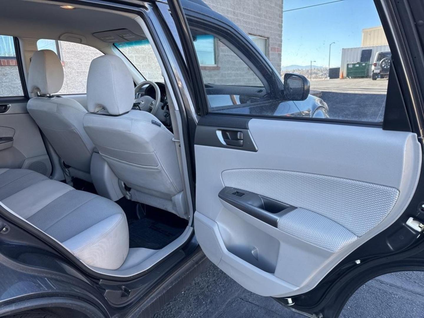 2012 Dark Gray Metallic /Platinum Subaru Forester 2.5X (JF2SHBBC1CH) with an 2.5L 4-Cylinder DOHC 16V VVT engine, Automatic transmission, located at 8595 Washington St., Thornton, CO, 80229, (303) 287-5511, 39.852348, -104.978447 - 2012 Subaru Forester AWD All Cars Have Clean Titles And Are Serviced Before Sale., Non Smoker, No Pet Odor Or Hair, Forester 2.5X, AWD.<br><br>D1 Auto NEVER charges dealer fees! All cars have clean titles and have been inspected for mechanical issues. We have financing for everyone. Good credit, bad - Photo#19