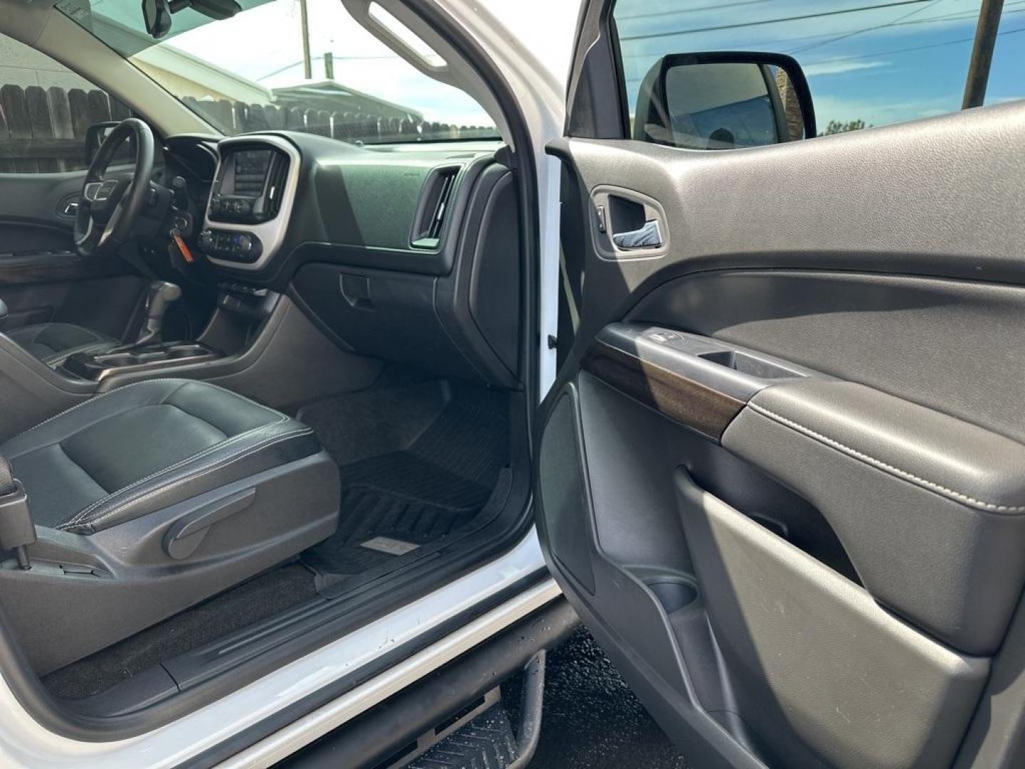 2015 Summit White /Black GMC Canyon SLE1 (1GTG6BE3XF1) with an 3.6L V6 DGI DOHC VVT engine, Automatic transmission, located at 8595 Washington St., Thornton, CO, 80229, (303) 287-5511, 39.852348, -104.978447 - 2015 GMC Canyon Clean Carfax, No Accident, Non Smoker, Non Pet Truck, Backup Camera, Leather, Power Seats, LIFTED and hard tonneau cover with locks.Canyon SLE1, 3.6L V6 DGI DOHC VVT, 4WD.<br><br> D1 Auto NEVER charges dealer fees! All cars have clean titles and have been inspected for mechanical iss - Photo#22