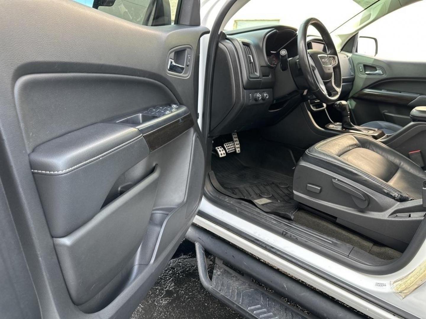 2015 Summit White /Black GMC Canyon SLE1 (1GTG6BE3XF1) with an 3.6L V6 DGI DOHC VVT engine, Automatic transmission, located at 8595 Washington St., Thornton, CO, 80229, (303) 287-5511, 39.852348, -104.978447 - 2015 GMC Canyon Clean Carfax, No Accident, Non Smoker, Non Pet Truck, Backup Camera, Leather, Power Seats, LIFTED and hard tonneau cover with locks.Canyon SLE1, 3.6L V6 DGI DOHC VVT, 4WD.<br><br> D1 Auto NEVER charges dealer fees! All cars have clean titles and have been inspected for mechanical iss - Photo#23