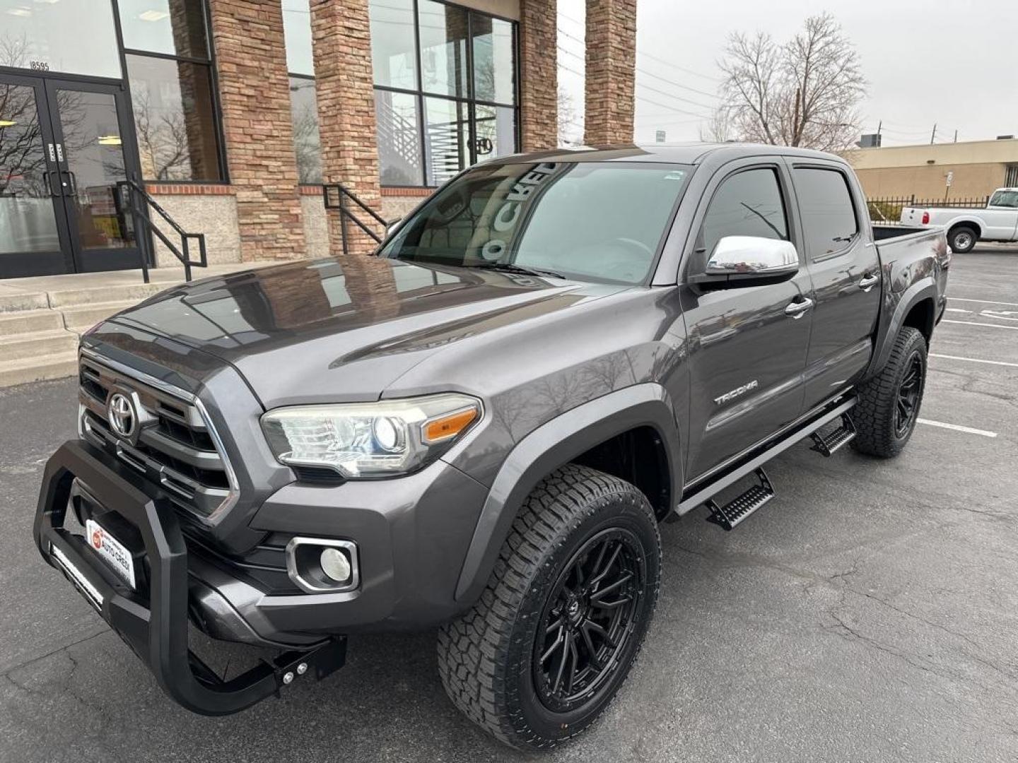 2016 Magnetic Gray Metallic /Hickory Toyota Tacoma Limited (5TFGZ5AN6GX) with an V6 engine, Automatic transmission, located at 8595 Washington St., Thornton, CO, 80229, (303) 287-5511, 39.852348, -104.978447 - 2016 Toyota Tacoma Limited in Excellent Condition! <br><br>All Cars Have Clean Titles And Are Serviced Before Sale.<br>New Tires, Blind Spot Monitoring, Backup Camera, Leather, Heated Seats, Bluetooth/ With Bluetooth Audio, Power Seats, Non Smoker, No Pet Odor Or Hair, Tacoma Limited V6, 4WD, Power - Photo#1