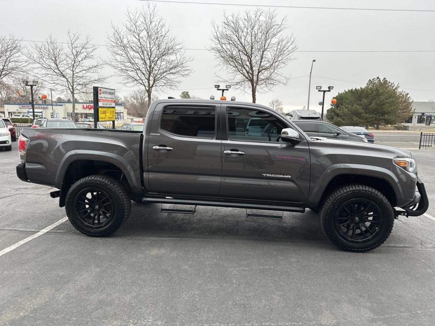 2016 Magnetic Gray Metallic /Hickory Toyota Tacoma Limited (5TFGZ5AN6GX) with an V6 engine, Automatic transmission, located at 8595 Washington St., Thornton, CO, 80229, (303) 287-5511, 39.852348, -104.978447 - 2016 Toyota Tacoma Limited in Excellent Condition! <br><br>All Cars Have Clean Titles And Are Serviced Before Sale.<br>New Tires, Blind Spot Monitoring, Backup Camera, Leather, Heated Seats, Bluetooth/ With Bluetooth Audio, Power Seats, Non Smoker, No Pet Odor Or Hair, Tacoma Limited V6, 4WD, Power - Photo#4