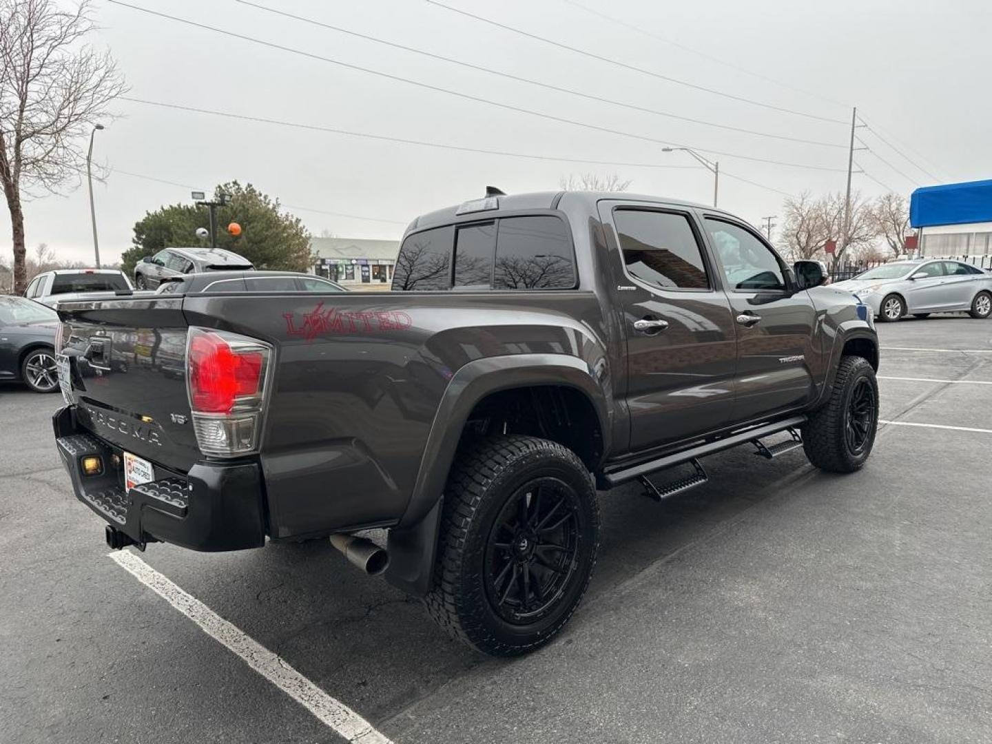 2016 Magnetic Gray Metallic /Hickory Toyota Tacoma Limited (5TFGZ5AN6GX) with an V6 engine, Automatic transmission, located at 8595 Washington St., Thornton, CO, 80229, (303) 287-5511, 39.852348, -104.978447 - 2016 Toyota Tacoma Limited in Excellent Condition! <br><br>All Cars Have Clean Titles And Are Serviced Before Sale.<br>New Tires, Blind Spot Monitoring, Backup Camera, Leather, Heated Seats, Bluetooth/ With Bluetooth Audio, Power Seats, Non Smoker, No Pet Odor Or Hair, Tacoma Limited V6, 4WD, Power - Photo#5