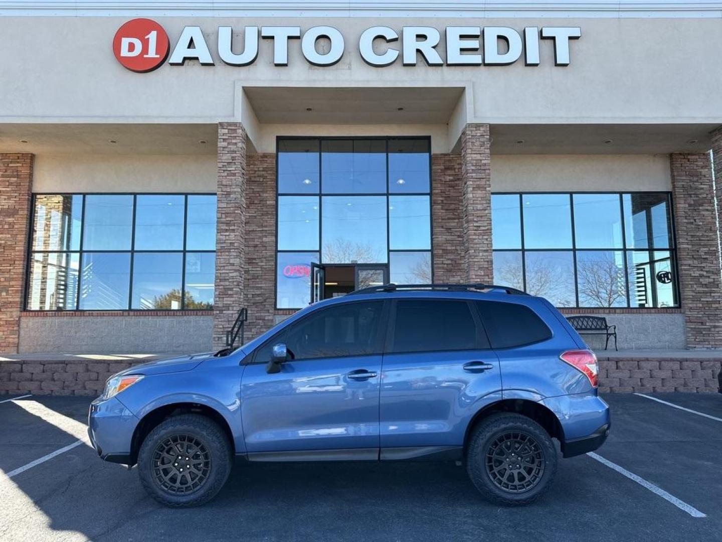 2016 Quartz Blue Pearl /Gray Subaru Forester 2.5i Premium (JF2SJAFC1GH) with an 2.5L 4-Cylinder DOHC 16V VVT engine, CVT transmission, located at 8595 Washington St., Thornton, CO, 80229, (303) 287-5511, 39.852348, -104.978447 - 2016 Subaru Forester Clean Carfax, No Accident, 2 inch lift with New Tires, Backup Camera, Heated Seats, Bluetooth/ With Bluetooth Audio, LIFTED!, AWD. <br><br>D1 Auto NEVER charges dealer fees! All cars have clean titles and have been inspected for mechanical issues. We have financing for everyone. - Photo#0