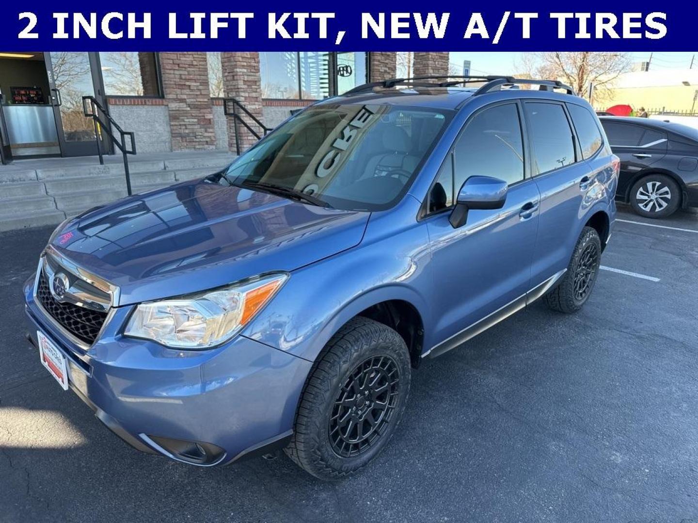2016 Quartz Blue Pearl /Gray Subaru Forester 2.5i Premium (JF2SJAFC1GH) with an 2.5L 4-Cylinder DOHC 16V VVT engine, CVT transmission, located at 8595 Washington St., Thornton, CO, 80229, (303) 287-5511, 39.852348, -104.978447 - 2016 Subaru Forester Clean Carfax, No Accident, 2 inch lift with New Tires, Backup Camera, Heated Seats, Bluetooth/ With Bluetooth Audio, LIFTED!, AWD. <br><br>D1 Auto NEVER charges dealer fees! All cars have clean titles and have been inspected for mechanical issues. We have financing for everyone. - Photo#1