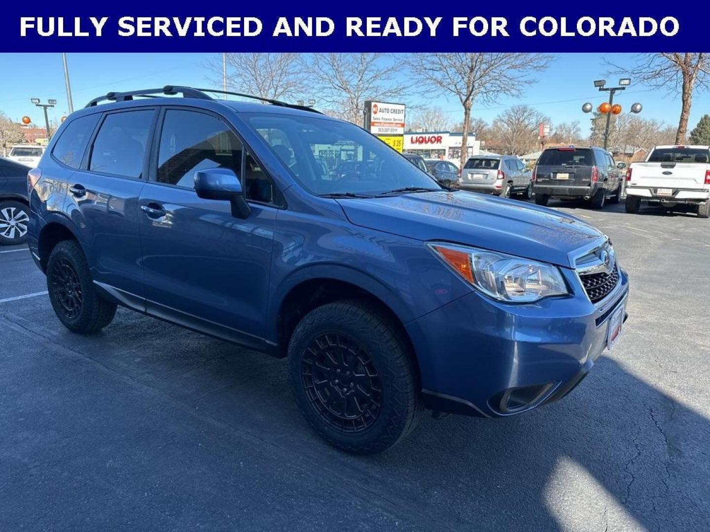 2016 Quartz Blue Pearl /Gray Subaru Forester 2.5i Premium (JF2SJAFC1GH) with an 2.5L 4-Cylinder DOHC 16V VVT engine, CVT transmission, located at 8595 Washington St., Thornton, CO, 80229, (303) 287-5511, 39.852348, -104.978447 - 2016 Subaru Forester Clean Carfax, No Accident, 2 inch lift with New Tires, Backup Camera, Heated Seats, Bluetooth/ With Bluetooth Audio, LIFTED!, AWD. <br><br>D1 Auto NEVER charges dealer fees! All cars have clean titles and have been inspected for mechanical issues. We have financing for everyone. - Photo#3