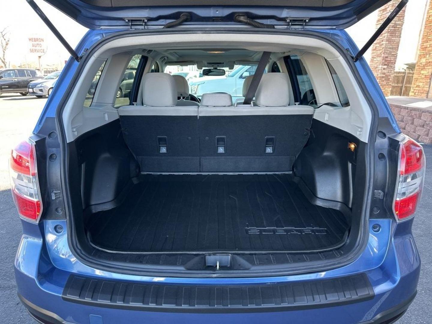 2016 Quartz Blue Pearl /Gray Subaru Forester 2.5i Premium (JF2SJAFC1GH) with an 2.5L 4-Cylinder DOHC 16V VVT engine, CVT transmission, located at 8595 Washington St., Thornton, CO, 80229, (303) 287-5511, 39.852348, -104.978447 - 2016 Subaru Forester Clean Carfax, No Accident, 2 inch lift with New Tires, Backup Camera, Heated Seats, Bluetooth/ With Bluetooth Audio, LIFTED!, AWD. <br><br>D1 Auto NEVER charges dealer fees! All cars have clean titles and have been inspected for mechanical issues. We have financing for everyone. - Photo#24