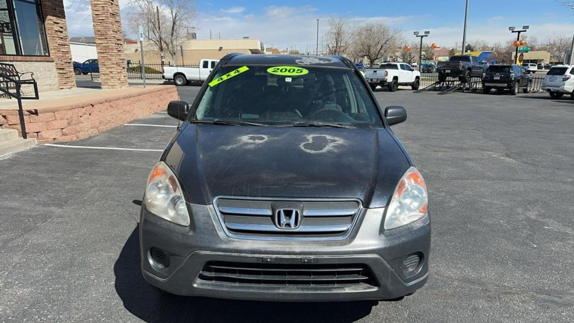 2005 Nighthawk Black Pearl /Blue Honda CR-V LX (JHLRD78595C) with an 2.4L I4 SMPI DOHC engine, Automatic transmission, located at 8595 Washington St., Thornton, CO, 80229, (303) 287-5511, 39.852348, -104.978447 - 2005 Honda CR-V<br><br>D1 Auto NEVER charges dealer fees! All cars have clean titles and have been inspected for mechanical issues. We have financing for everyone. Good credit, bad credit, first time buyers.<br>Clean CARFAX. Odometer is 35477 miles below market average!<br>Please call Lakewood Locat - Photo#1