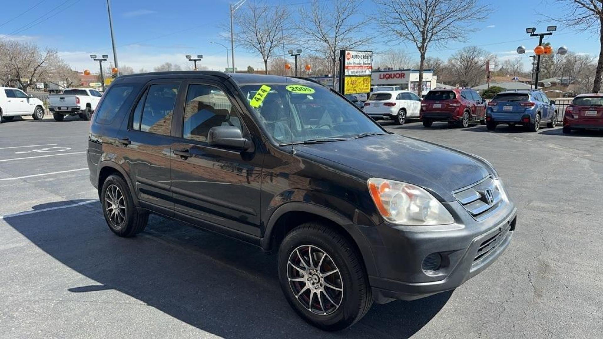 2005 Nighthawk Black Pearl /Blue Honda CR-V LX (JHLRD78595C) with an 2.4L I4 SMPI DOHC engine, Automatic transmission, located at 8595 Washington St., Thornton, CO, 80229, (303) 287-5511, 39.852348, -104.978447 - 2005 Honda CR-V<br><br>D1 Auto NEVER charges dealer fees! All cars have clean titles and have been inspected for mechanical issues. We have financing for everyone. Good credit, bad credit, first time buyers.<br>Clean CARFAX. Odometer is 35477 miles below market average!<br>Please call Lakewood Locat - Photo#2