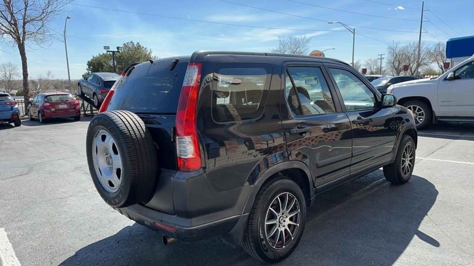 2005 Nighthawk Black Pearl /Blue Honda CR-V LX (JHLRD78595C) with an 2.4L I4 SMPI DOHC engine, Automatic transmission, located at 8595 Washington St., Thornton, CO, 80229, (303) 287-5511, 39.852348, -104.978447 - 2005 Honda CR-V<br><br>D1 Auto NEVER charges dealer fees! All cars have clean titles and have been inspected for mechanical issues. We have financing for everyone. Good credit, bad credit, first time buyers.<br>Clean CARFAX. Odometer is 35477 miles below market average!<br>Please call Lakewood Locat - Photo#4