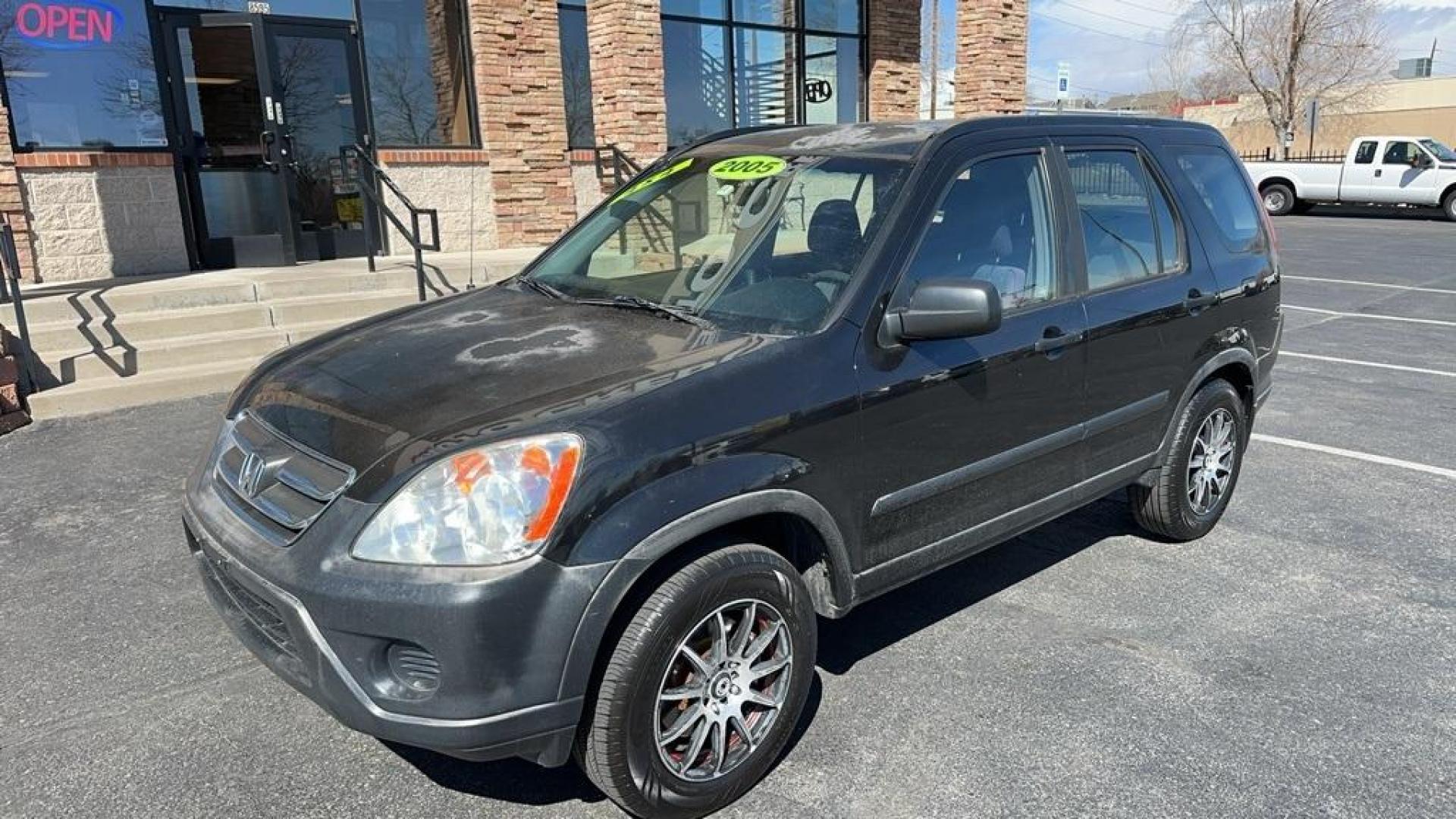 2005 Nighthawk Black Pearl /Blue Honda CR-V LX (JHLRD78595C) with an 2.4L I4 SMPI DOHC engine, Automatic transmission, located at 8595 Washington St., Thornton, CO, 80229, (303) 287-5511, 39.852348, -104.978447 - 2005 Honda CR-V<br><br>D1 Auto NEVER charges dealer fees! All cars have clean titles and have been inspected for mechanical issues. We have financing for everyone. Good credit, bad credit, first time buyers.<br>Clean CARFAX. Odometer is 35477 miles below market average!<br>Please call Lakewood Locat - Photo#7