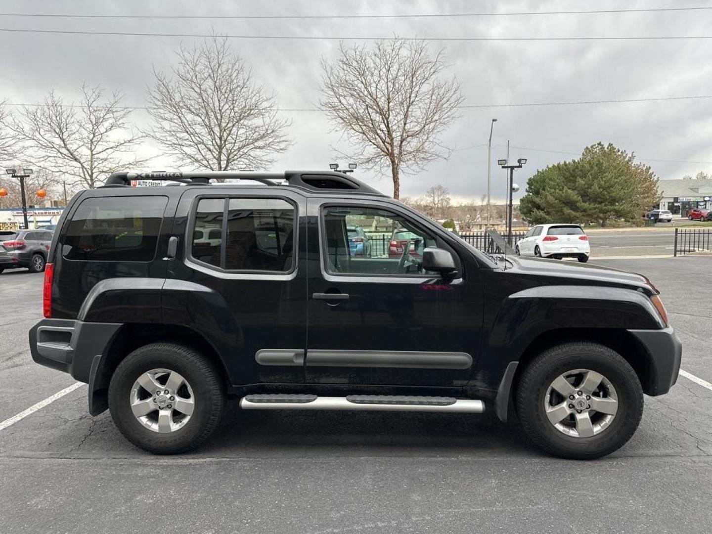 2012 Super Black Metallic /Gray Nissan Xterra S (5N1AN0NW7CC) with an 4.0L V6 DOHC 24V engine, Automatic transmission, located at 8595 Washington St., Thornton, CO, 80229, (303) 287-5511, 39.852348, -104.978447 - 2012 Nissan Xterra<br><br>D1 Auto NEVER charges dealer fees! All cars have clean titles and have been inspected for mechanical issues. We have financing for everyone. Good credit, bad credit, first time buyers.<br>CARFAX One-Owner.<br>Please call Lakewood Location 303-274-7692 or Thornton 303-287-55 - Photo#4