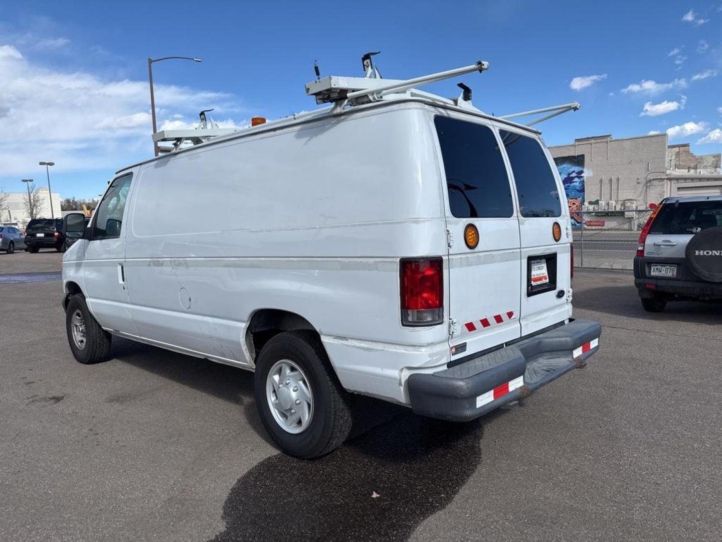 2007 Oxford White Clearcoat /Medium Pebble Ford E-250 (1FTNE24L67D) with an 5.4L V8 EFI engine, Automatic transmission, located at 8595 Washington St., Thornton, CO, 80229, (303) 287-5511, 39.852348, -104.978447 - 2007 Ford E-250 CARFAX One-Owner. RWD<br><br>D1 Auto NEVER charges dealer fees! All cars have clean titles and have been inspected for mechanical issues. We have financing for everyone. Good credit, bad credit, first time buyers.<br><br>Please call Lakewood Location 303-274-7692 or Thornton 303-287- - Photo#4