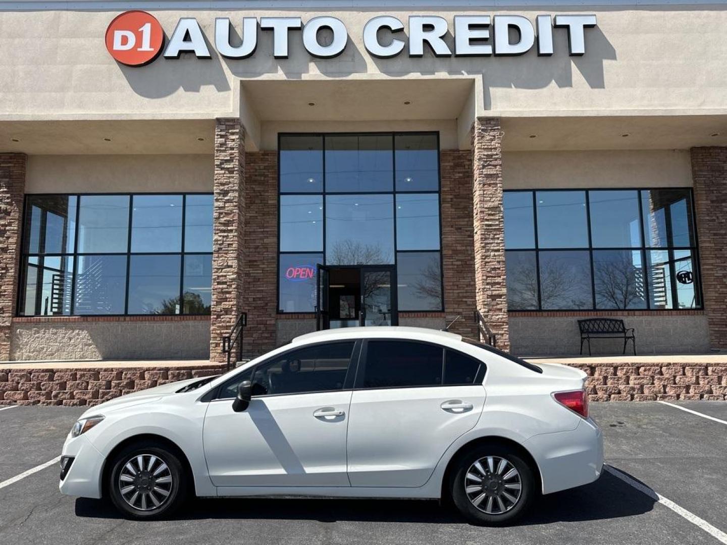 2016 Crystal White Pearl /Black Subaru Impreza 2.0i (JF1GJAA67GH) with an 2.0L 4-Cylinder DOHC 16V engine, CVT transmission, located at 8595 Washington St., Thornton, CO, 80229, (303) 287-5511, 39.852348, -104.978447 - 2016 Subaru Impreza All Wheel Drive<br><br>All Cars Have Clean Titles And Are Serviced Before Sale., Clean Carfax, No Accident, Backup Camera, Non Smoker, No Pet Odor Or Hair, Impreza 2.0i, AWD.<br><br>D1 Auto NEVER charges dealer fees! All cars have clean titles and have been inspected for mechanic - Photo#0