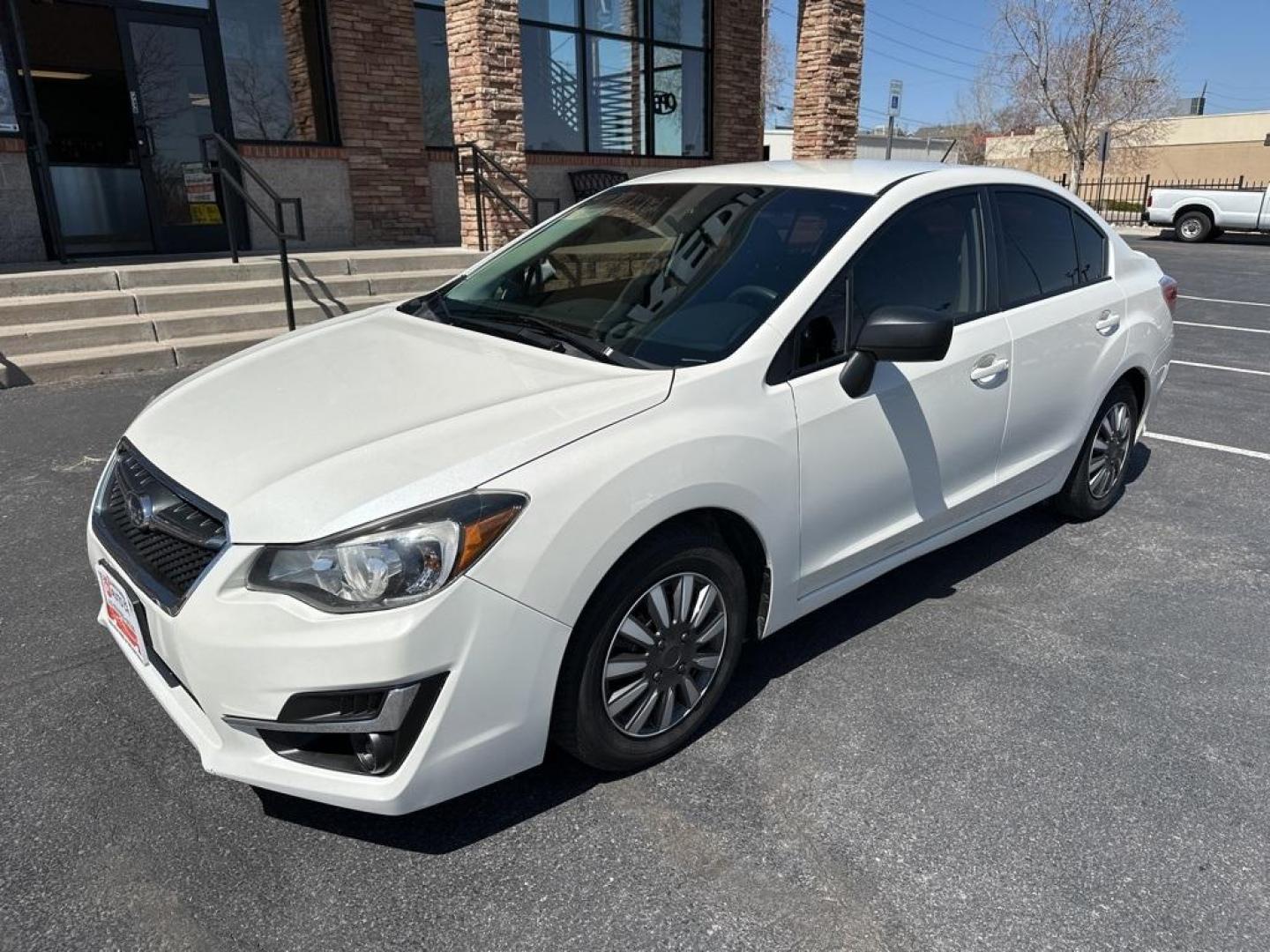 2016 Crystal White Pearl /Black Subaru Impreza 2.0i (JF1GJAA67GH) with an 2.0L 4-Cylinder DOHC 16V engine, CVT transmission, located at 8595 Washington St., Thornton, CO, 80229, (303) 287-5511, 39.852348, -104.978447 - 2016 Subaru Impreza All Wheel Drive<br><br>All Cars Have Clean Titles And Are Serviced Before Sale., Clean Carfax, No Accident, Backup Camera, Non Smoker, No Pet Odor Or Hair, Impreza 2.0i, AWD.<br><br>D1 Auto NEVER charges dealer fees! All cars have clean titles and have been inspected for mechanic - Photo#1