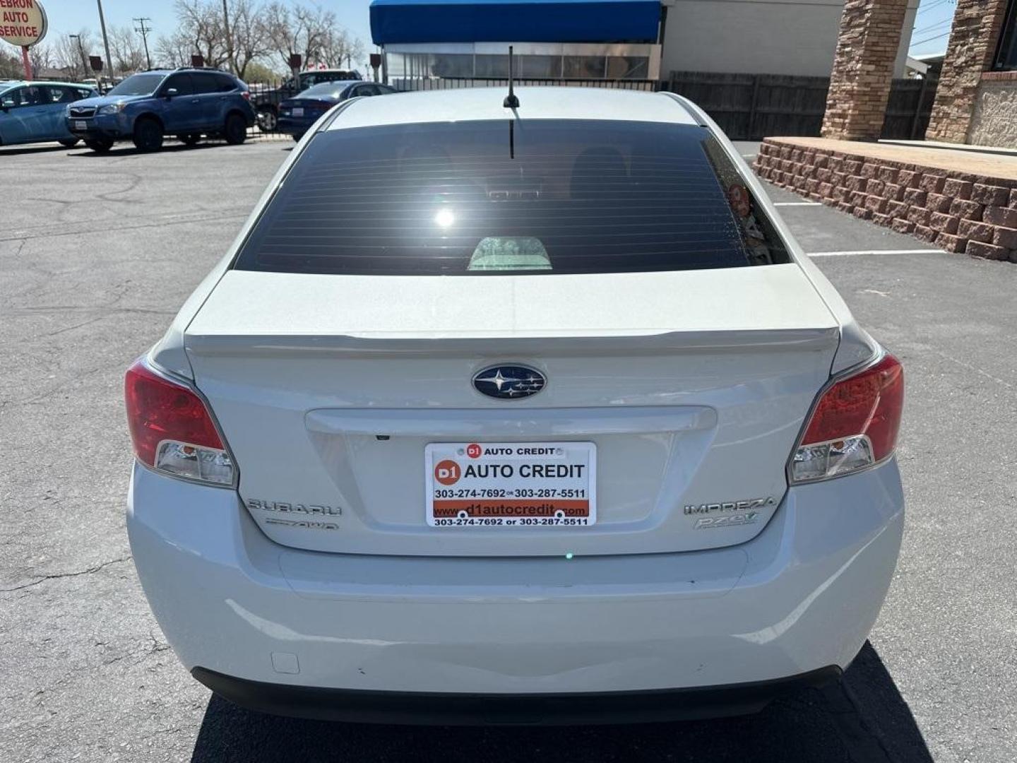 2016 Crystal White Pearl /Black Subaru Impreza 2.0i (JF1GJAA67GH) with an 2.0L 4-Cylinder DOHC 16V engine, CVT transmission, located at 8595 Washington St., Thornton, CO, 80229, (303) 287-5511, 39.852348, -104.978447 - 2016 Subaru Impreza All Wheel Drive<br><br>All Cars Have Clean Titles And Are Serviced Before Sale., Clean Carfax, No Accident, Backup Camera, Non Smoker, No Pet Odor Or Hair, Impreza 2.0i, AWD.<br><br>D1 Auto NEVER charges dealer fees! All cars have clean titles and have been inspected for mechanic - Photo#6