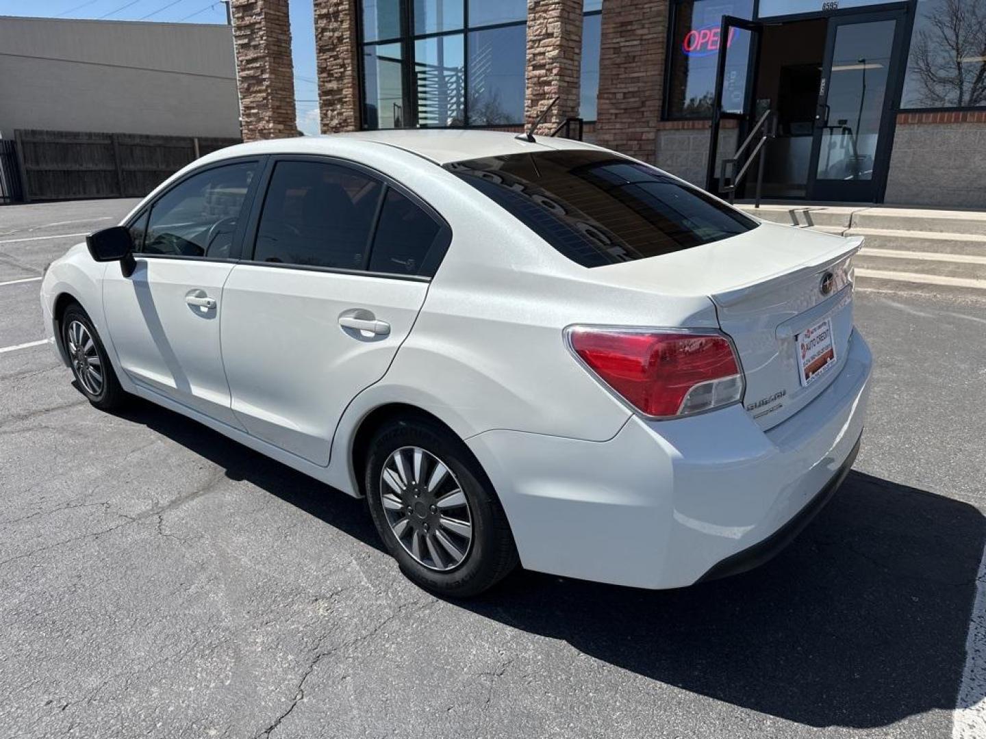 2016 Crystal White Pearl /Black Subaru Impreza 2.0i (JF1GJAA67GH) with an 2.0L 4-Cylinder DOHC 16V engine, CVT transmission, located at 8595 Washington St., Thornton, CO, 80229, (303) 287-5511, 39.852348, -104.978447 - 2016 Subaru Impreza All Wheel Drive<br><br>All Cars Have Clean Titles And Are Serviced Before Sale., Clean Carfax, No Accident, Backup Camera, Non Smoker, No Pet Odor Or Hair, Impreza 2.0i, AWD.<br><br>D1 Auto NEVER charges dealer fees! All cars have clean titles and have been inspected for mechanic - Photo#7