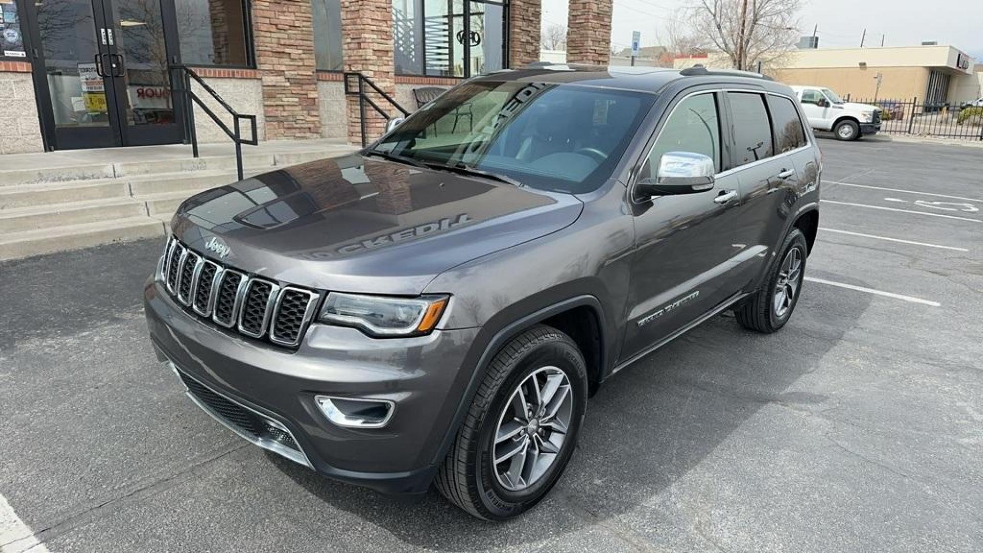 2017 Granite Crystal Metallic Clearcoat /Black Jeep Grand Cherokee Limited (1C4RJFBG0HC) with an 3.6L V6 24V VVT engine, Automatic transmission, located at 8595 Washington St., Thornton, CO, 80229, (303) 287-5511, 39.852348, -104.978447 - 2017 Jeep Grand Cherokee Limited and in absolute mint condition inside and out. You will not find a cleaner one! <br><br>All Cars Have Clean Titles And Are Serviced Before Sale.Clean Carfax, No Accident, Panoramic Sun Roof, Backup Camera, Leather, Heated and Ventilated Seats, Heated Steering Wheel, - Photo#1