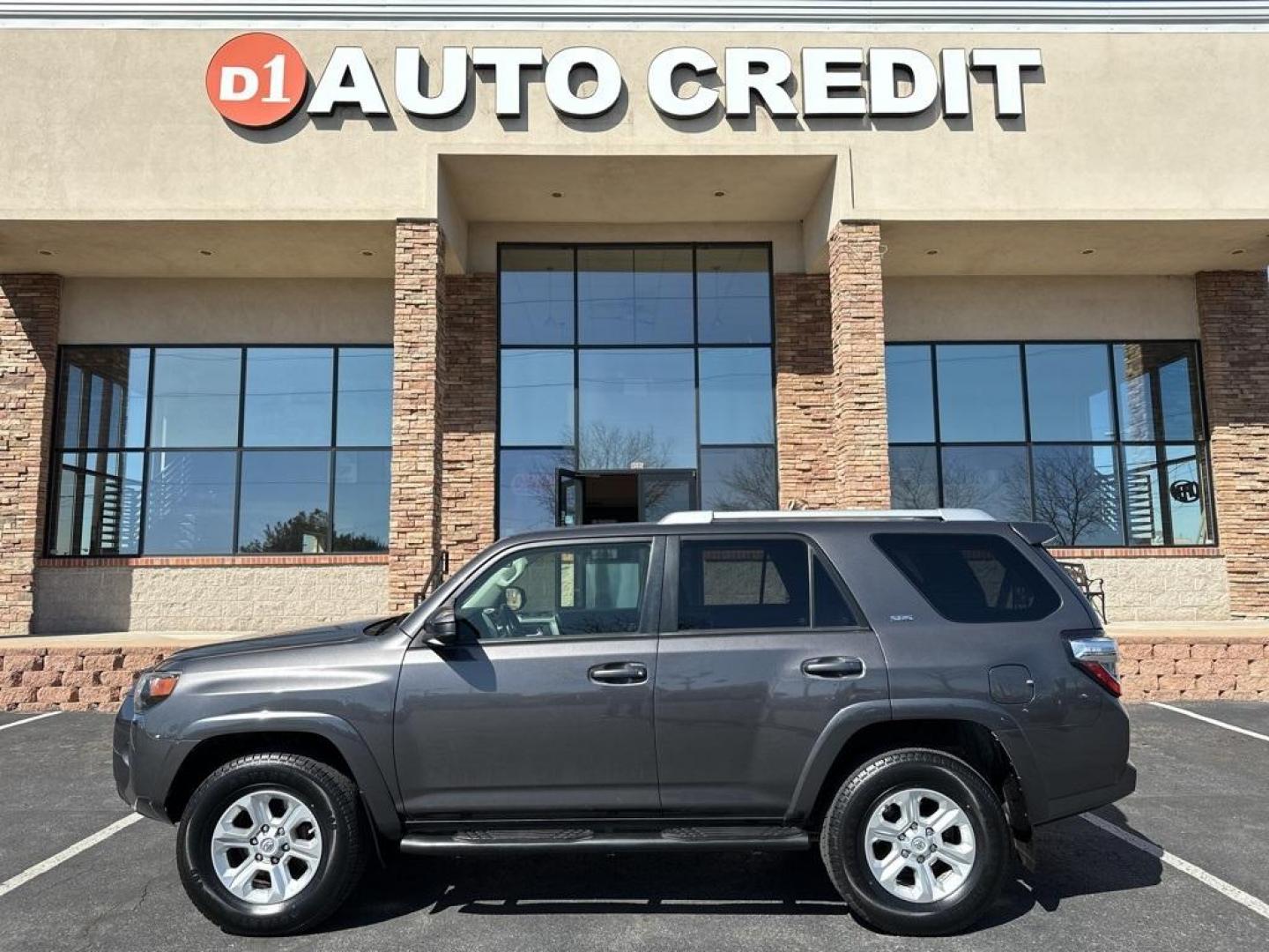 2014 Magnetic Gray Metallic /Black Toyota 4Runner SR5 (JTEBU5JR4E5) with an 4.0L V6 SMPI DOHC engine, Automatic transmission, located at 8595 Washington St., Thornton, CO, 80229, (303) 287-5511, 39.852348, -104.978447 - 2014 Toyota 4Runner With 3rd Row Seat! Fully serviced with clean title.<br><br>New Tires, Backup Camera, Non Smoker, 4Runner SR5, 4WD.<br><br>D1 Auto NEVER charges dealer fees! All cars have clean titles and have been inspected for mechanical issues. We have financing for everyone. Good credit, bad - Photo#0