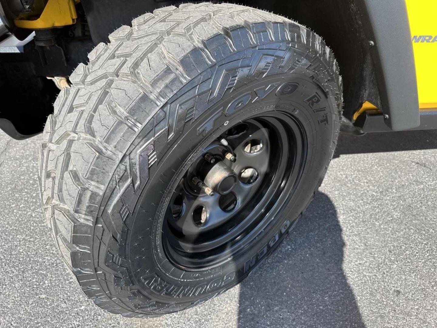 2015 Baja Yellow Clearcoat /Black Jeep Wrangler Willys Wheeler (1C4AJWAG6FL) with an 3.6L V6 24V VVT engine, Manual transmission, located at 8595 Washington St., Thornton, CO, 80229, (303) 287-5511, 39.852348, -104.978447 - 2015 Jeep Wrangler<br><br>D1 Auto NEVER charges dealer fees! All cars have clean titles and have been inspected for mechanical issues. We have financing for everyone. Good credit, bad credit, first time buyers.<br>Clean CARFAX.<br>Please call Lakewood Location 303-274-7692 or Thornton 303-287-5511 t - Photo#18