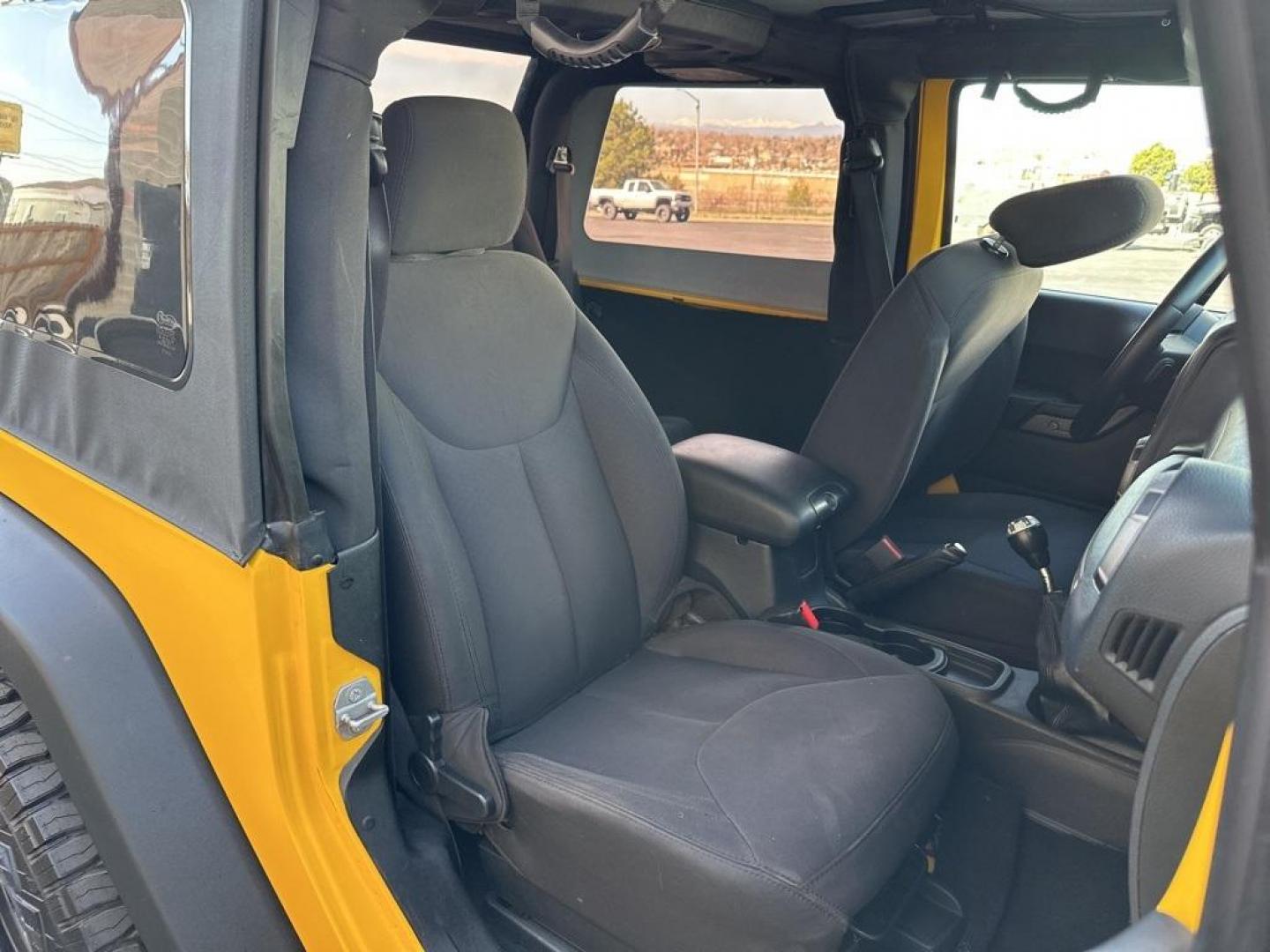 2015 Baja Yellow Clearcoat /Black Jeep Wrangler Willys Wheeler (1C4AJWAG6FL) with an 3.6L V6 24V VVT engine, Manual transmission, located at 8595 Washington St., Thornton, CO, 80229, (303) 287-5511, 39.852348, -104.978447 - 2015 Jeep Wrangler<br><br>D1 Auto NEVER charges dealer fees! All cars have clean titles and have been inspected for mechanical issues. We have financing for everyone. Good credit, bad credit, first time buyers.<br>Clean CARFAX.<br>Please call Lakewood Location 303-274-7692 or Thornton 303-287-5511 t - Photo#21