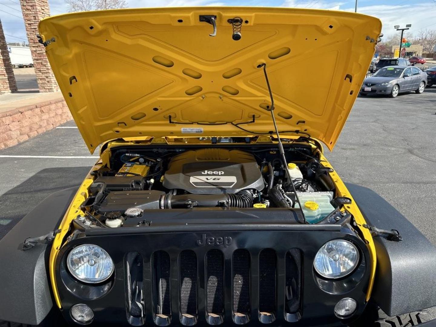 2015 Baja Yellow Clearcoat /Black Jeep Wrangler Willys Wheeler (1C4AJWAG6FL) with an 3.6L V6 24V VVT engine, Manual transmission, located at 8595 Washington St., Thornton, CO, 80229, (303) 287-5511, 39.852348, -104.978447 - 2015 Jeep Wrangler<br><br>D1 Auto NEVER charges dealer fees! All cars have clean titles and have been inspected for mechanical issues. We have financing for everyone. Good credit, bad credit, first time buyers.<br>Clean CARFAX.<br>Please call Lakewood Location 303-274-7692 or Thornton 303-287-5511 t - Photo#29