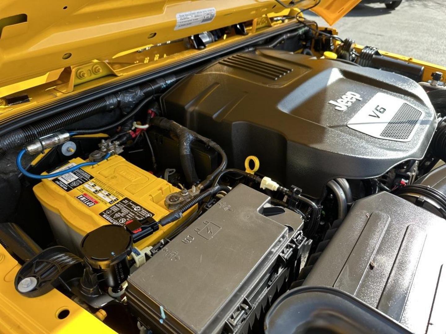 2015 Baja Yellow Clearcoat /Black Jeep Wrangler Willys Wheeler (1C4AJWAG6FL) with an 3.6L V6 24V VVT engine, Manual transmission, located at 8595 Washington St., Thornton, CO, 80229, (303) 287-5511, 39.852348, -104.978447 - 2015 Jeep Wrangler<br><br>D1 Auto NEVER charges dealer fees! All cars have clean titles and have been inspected for mechanical issues. We have financing for everyone. Good credit, bad credit, first time buyers.<br>Clean CARFAX.<br>Please call Lakewood Location 303-274-7692 or Thornton 303-287-5511 t - Photo#30