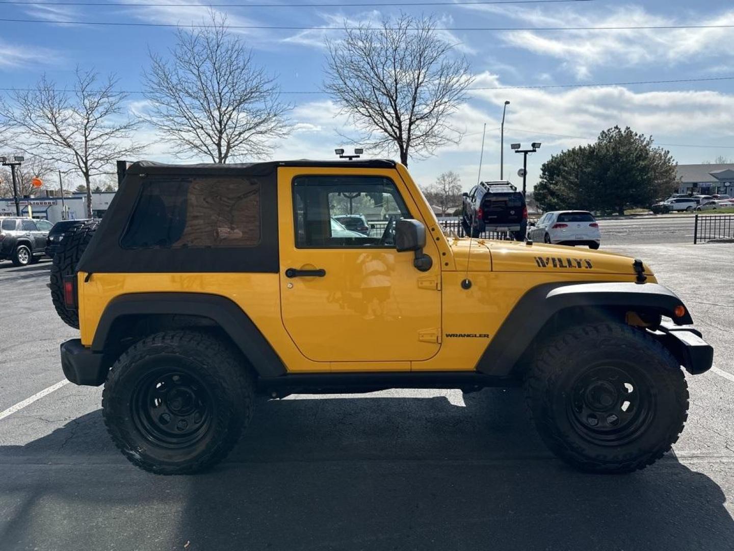 2015 Baja Yellow Clearcoat /Black Jeep Wrangler Willys Wheeler (1C4AJWAG6FL) with an 3.6L V6 24V VVT engine, Manual transmission, located at 8595 Washington St., Thornton, CO, 80229, (303) 287-5511, 39.852348, -104.978447 - 2015 Jeep Wrangler<br><br>D1 Auto NEVER charges dealer fees! All cars have clean titles and have been inspected for mechanical issues. We have financing for everyone. Good credit, bad credit, first time buyers.<br>Clean CARFAX.<br>Please call Lakewood Location 303-274-7692 or Thornton 303-287-5511 t - Photo#4