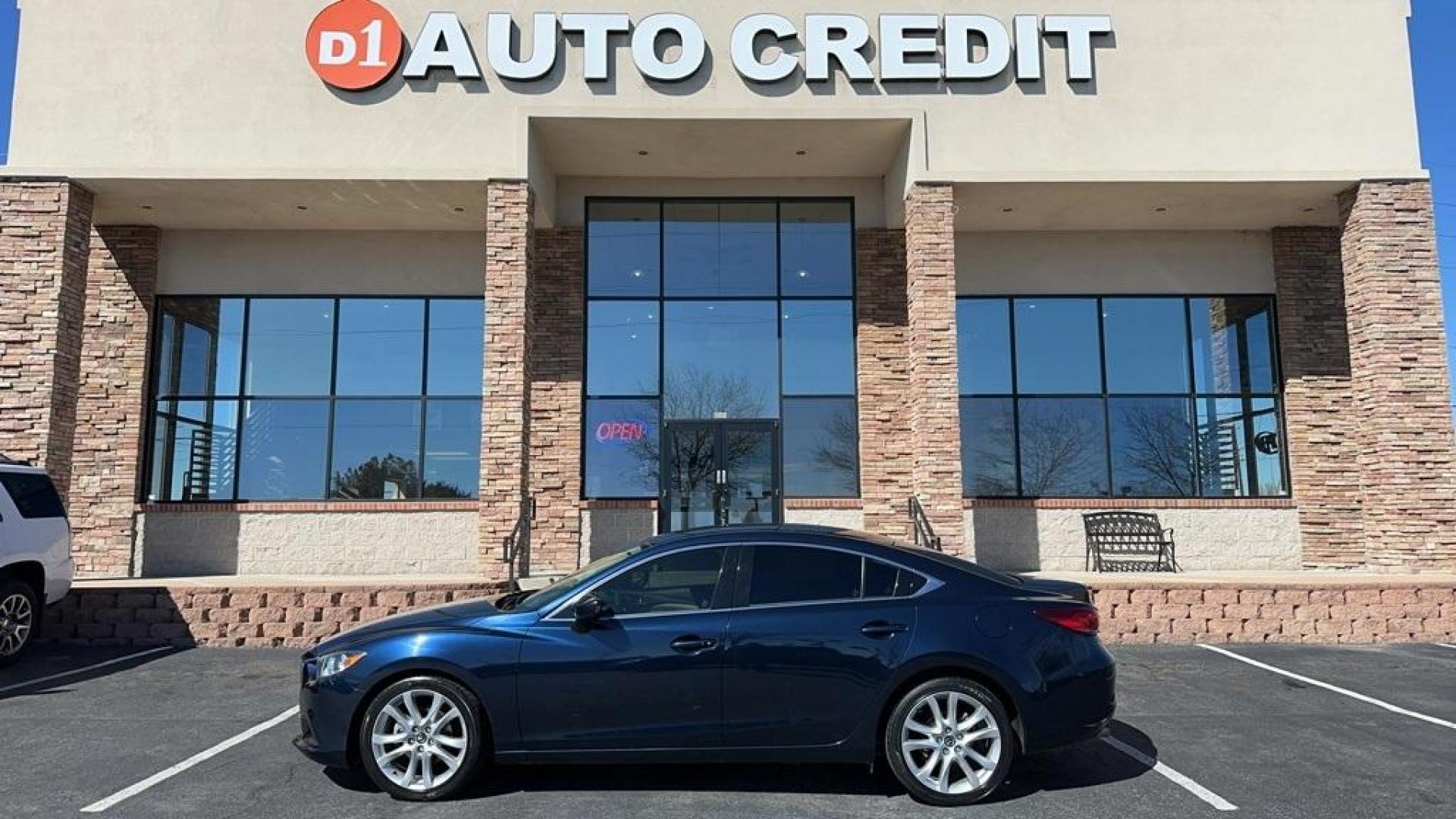 2016 Deep Crystal Blue Mica /Parchment Mazda Mazda6 i Touring (JM1GJ1V58G1) with an SKYACTIV-G 2.5L I4 DOHC 16V engine, Manual transmission, located at 8595 Washington St., Thornton, CO, 80229, (303) 287-5511, 39.852348, -104.978447 - 2016 Mazda Mazda6 Hard to find manual transmission.<br><br>New Tires, Blind Spot Monitoring, Backup Camera, Leather, Non Smoker, No Pet Odor Or Hair, Mazda6 i Touring, 6-Speed SKYACTIV-MT Manual.<br><br>D1 Auto NEVER charges dealer fees! All cars have clean titles and have been inspected for mechani - Photo#0
