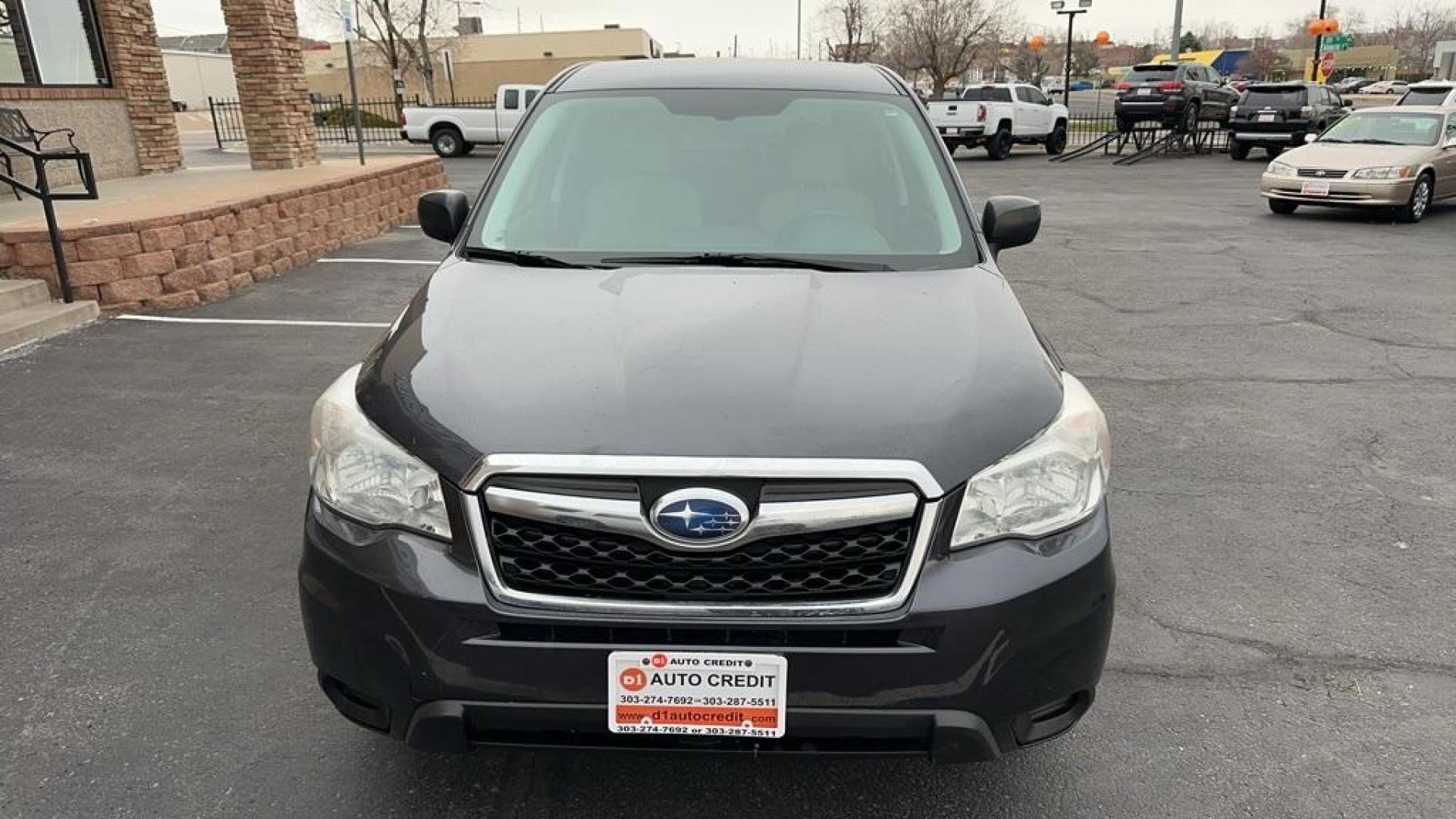 2014 Dark Gray Metallic /Gray Subaru Forester 2.5i (JF2SJAAC2EH) with an 2.5L 4-Cylinder DOHC 16V VVT engine, CVT transmission, located at 8595 Washington St., Thornton, CO, 80229, (303) 287-5511, 39.852348, -104.978447 - 2014 Subaru Forester<br>Clean Carfax, No Accident, All Books and Keys, Backup Camera, Non Smoker, No Pet Odor Or Hair, AWD.<br><br>D1 Auto NEVER charges dealer fees! All cars have clean titles and have been inspected for mechanical issues. We have financing for everyone. Good credit, bad credit, fir - Photo#2