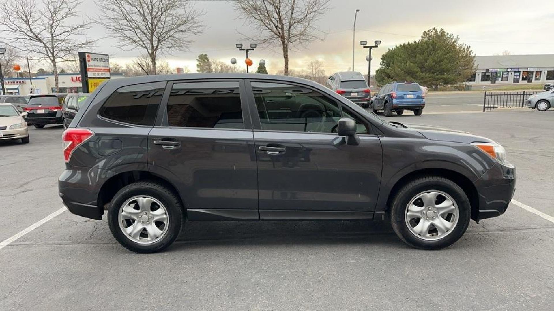 2014 Dark Gray Metallic /Gray Subaru Forester 2.5i (JF2SJAAC2EH) with an 2.5L 4-Cylinder DOHC 16V VVT engine, CVT transmission, located at 8595 Washington St., Thornton, CO, 80229, (303) 287-5511, 39.852348, -104.978447 - 2014 Subaru Forester<br>Clean Carfax, No Accident, All Books and Keys, Backup Camera, Non Smoker, No Pet Odor Or Hair, AWD.<br><br>D1 Auto NEVER charges dealer fees! All cars have clean titles and have been inspected for mechanical issues. We have financing for everyone. Good credit, bad credit, fir - Photo#4