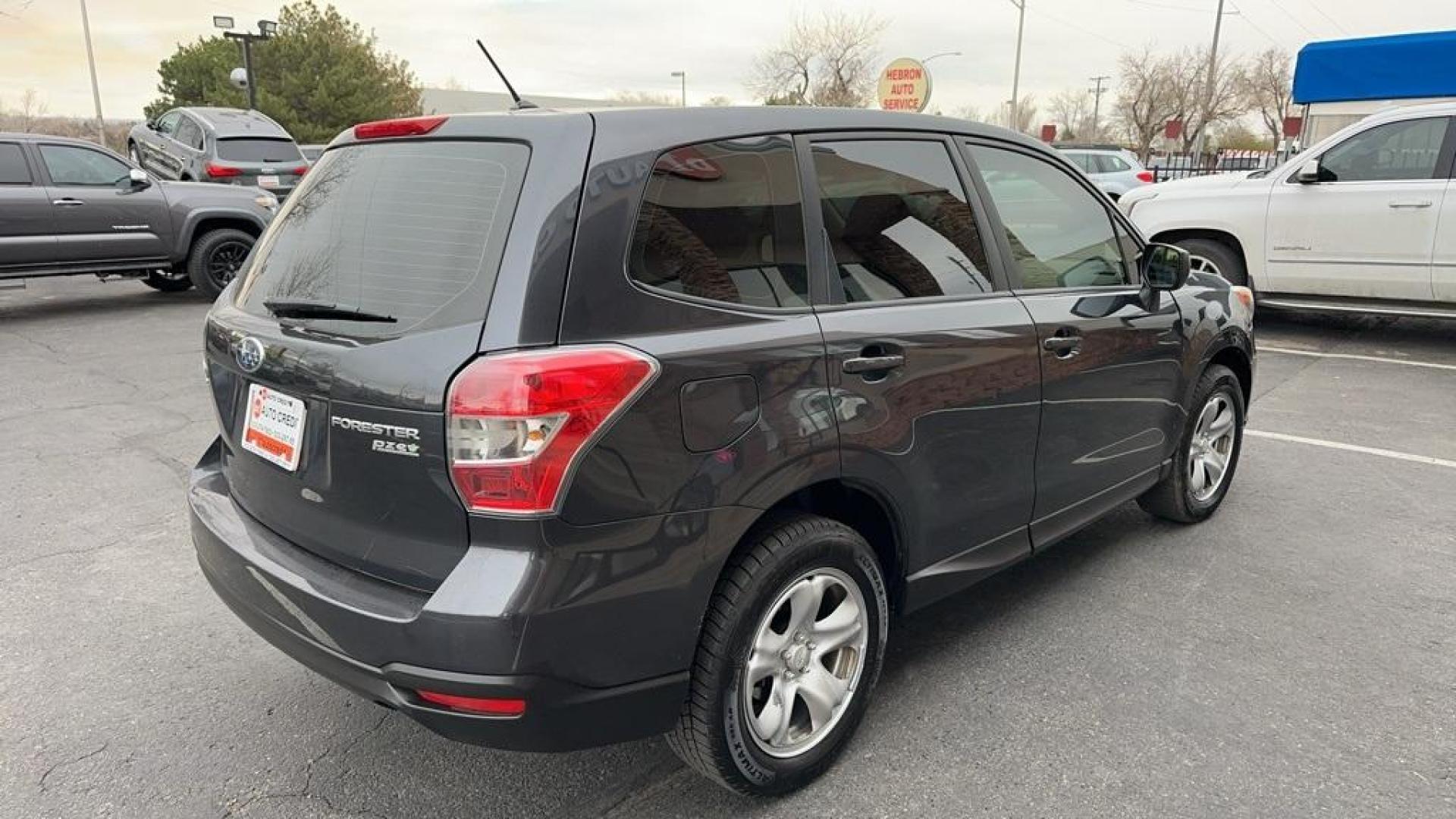 2014 Dark Gray Metallic /Gray Subaru Forester 2.5i (JF2SJAAC2EH) with an 2.5L 4-Cylinder DOHC 16V VVT engine, CVT transmission, located at 8595 Washington St., Thornton, CO, 80229, (303) 287-5511, 39.852348, -104.978447 - 2014 Subaru Forester<br>Clean Carfax, No Accident, All Books and Keys, Backup Camera, Non Smoker, No Pet Odor Or Hair, AWD.<br><br>D1 Auto NEVER charges dealer fees! All cars have clean titles and have been inspected for mechanical issues. We have financing for everyone. Good credit, bad credit, fir - Photo#5