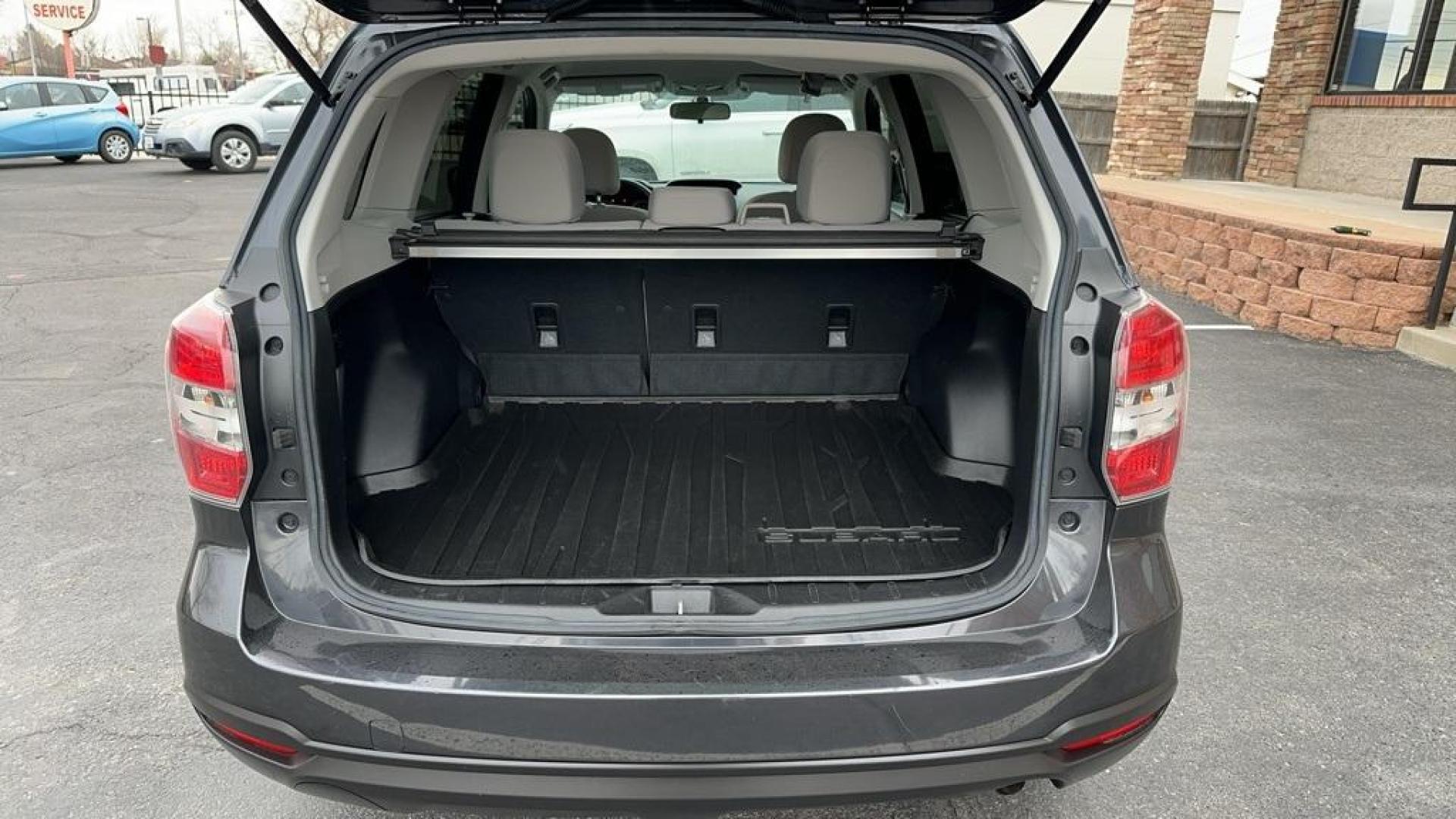 2014 Dark Gray Metallic /Gray Subaru Forester 2.5i (JF2SJAAC2EH) with an 2.5L 4-Cylinder DOHC 16V VVT engine, CVT transmission, located at 8595 Washington St., Thornton, CO, 80229, (303) 287-5511, 39.852348, -104.978447 - 2014 Subaru Forester<br>Clean Carfax, No Accident, All Books and Keys, Backup Camera, Non Smoker, No Pet Odor Or Hair, AWD.<br><br>D1 Auto NEVER charges dealer fees! All cars have clean titles and have been inspected for mechanical issues. We have financing for everyone. Good credit, bad credit, fir - Photo#16