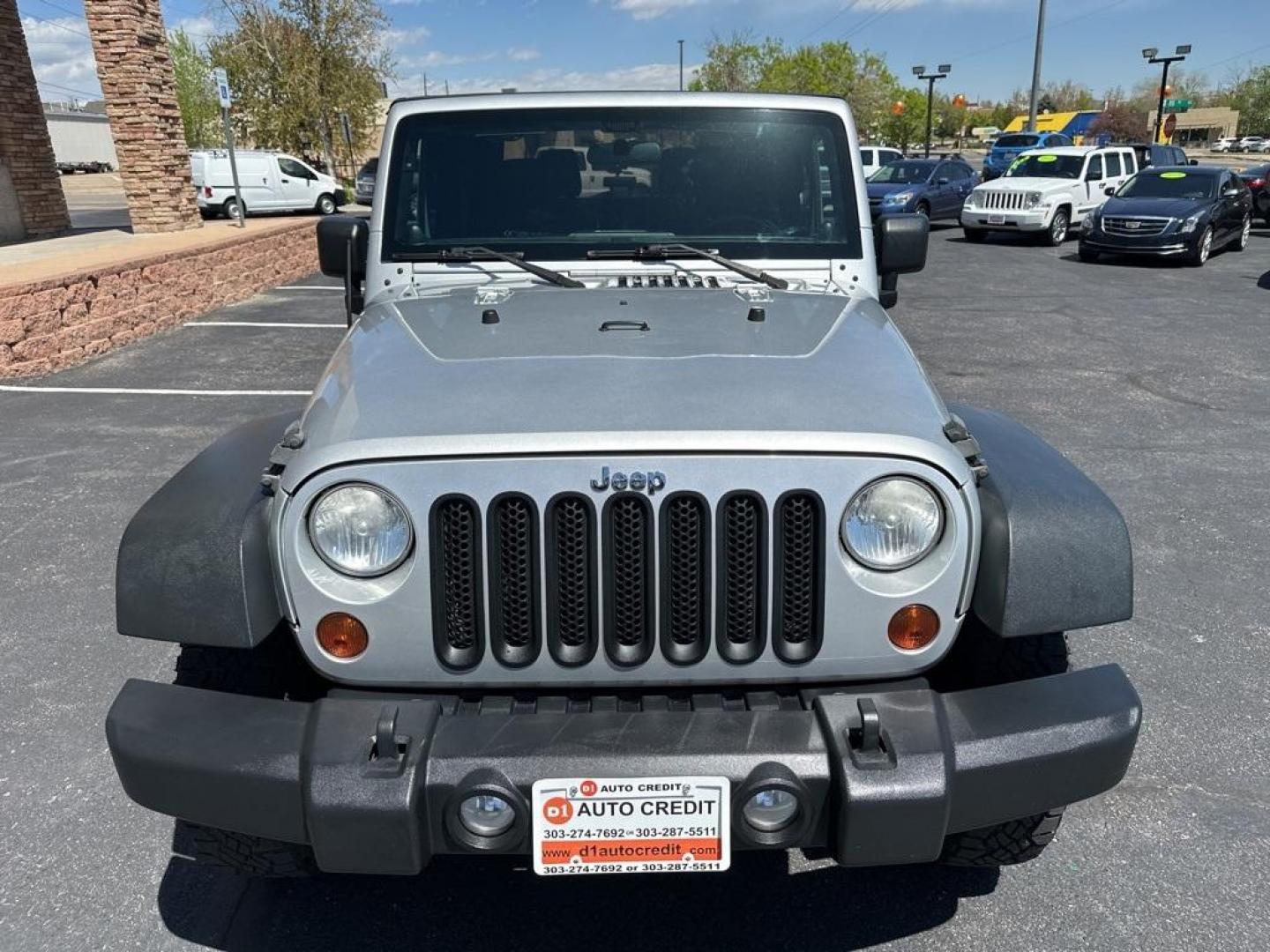 2011 Bright Silver Metallic Clearcoat /Black Interior Jeep Wrangler Sport (1J4GA2D13BL) with an 3.8L V6 SMPI engine, Automatic transmission, located at 8595 Washington St., Thornton, CO, 80229, (303) 287-5511, 39.852348, -104.978447 - 2011 Jeep Wrangler Automatic in Excellent Condition! <br><br>All Cars Have Clean Titles And Are Serviced Before Sale., Clean Carfax, No Accident, Non Smoker, No Pet Odor Or Hair, 4-Speed Automatic, 4WD.<br><br>D1 Auto NEVER charges dealer fees! All cars have clean titles and have been inspected for - Photo#2