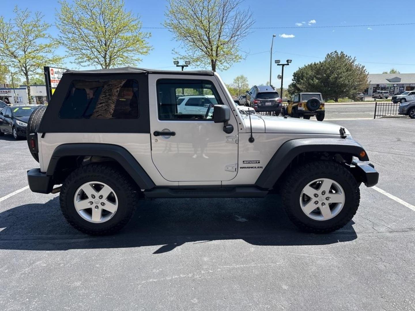 2011 Bright Silver Metallic Clearcoat /Black Interior Jeep Wrangler Sport (1J4GA2D13BL) with an 3.8L V6 SMPI engine, Automatic transmission, located at 8595 Washington St., Thornton, CO, 80229, (303) 287-5511, 39.852348, -104.978447 - 2011 Jeep Wrangler Automatic in Excellent Condition! <br><br>All Cars Have Clean Titles And Are Serviced Before Sale., Clean Carfax, No Accident, Non Smoker, No Pet Odor Or Hair, 4-Speed Automatic, 4WD.<br><br>D1 Auto NEVER charges dealer fees! All cars have clean titles and have been inspected for - Photo#4