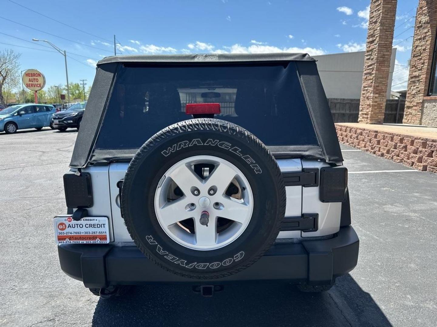 2011 Bright Silver Metallic Clearcoat /Black Interior Jeep Wrangler Sport (1J4GA2D13BL) with an 3.8L V6 SMPI engine, Automatic transmission, located at 8595 Washington St., Thornton, CO, 80229, (303) 287-5511, 39.852348, -104.978447 - 2011 Jeep Wrangler Automatic in Excellent Condition! <br><br>All Cars Have Clean Titles And Are Serviced Before Sale., Clean Carfax, No Accident, Non Smoker, No Pet Odor Or Hair, 4-Speed Automatic, 4WD.<br><br>D1 Auto NEVER charges dealer fees! All cars have clean titles and have been inspected for - Photo#6